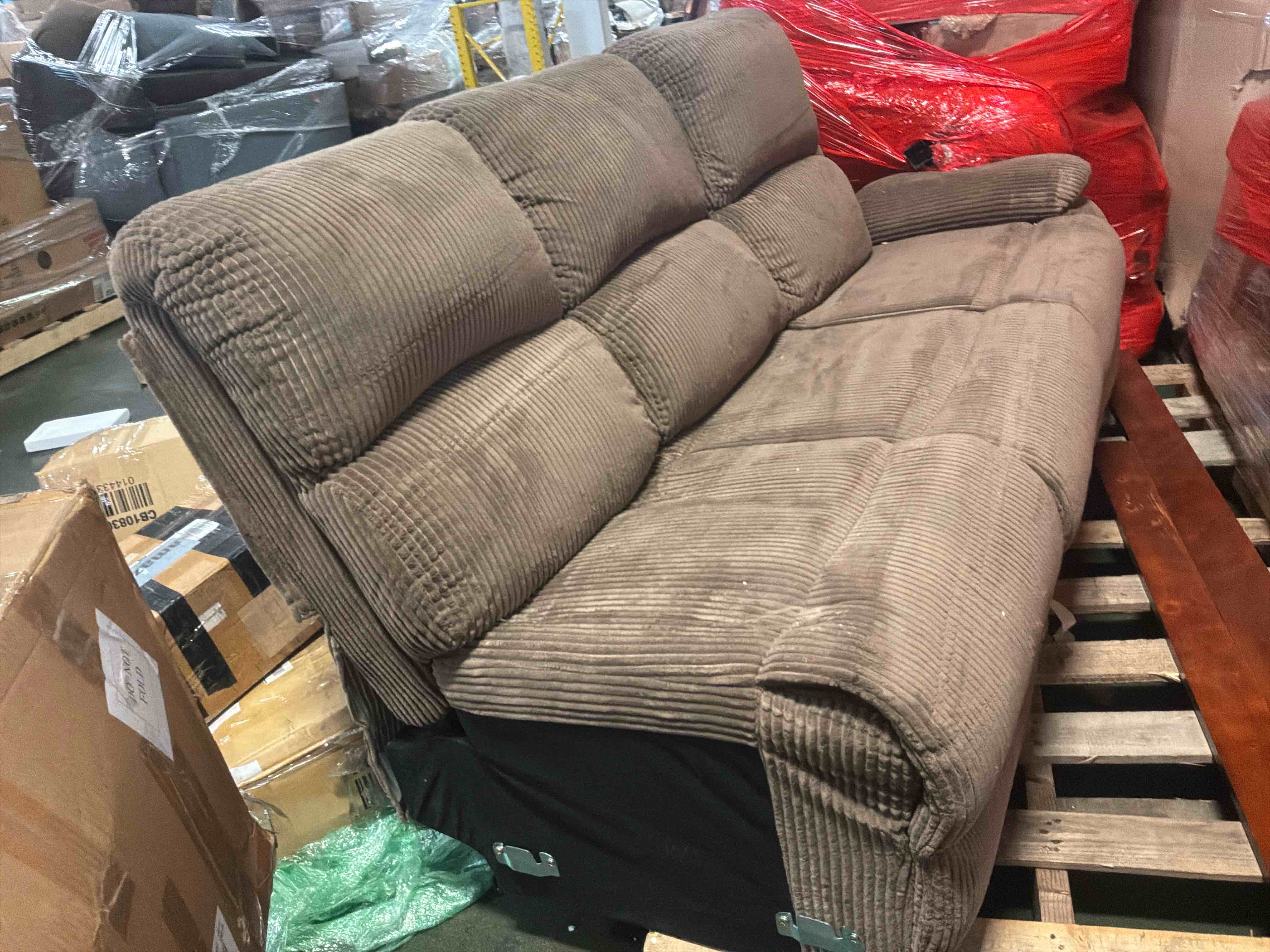 Condition photo showing New/Like New for scranto manual reclining sofa