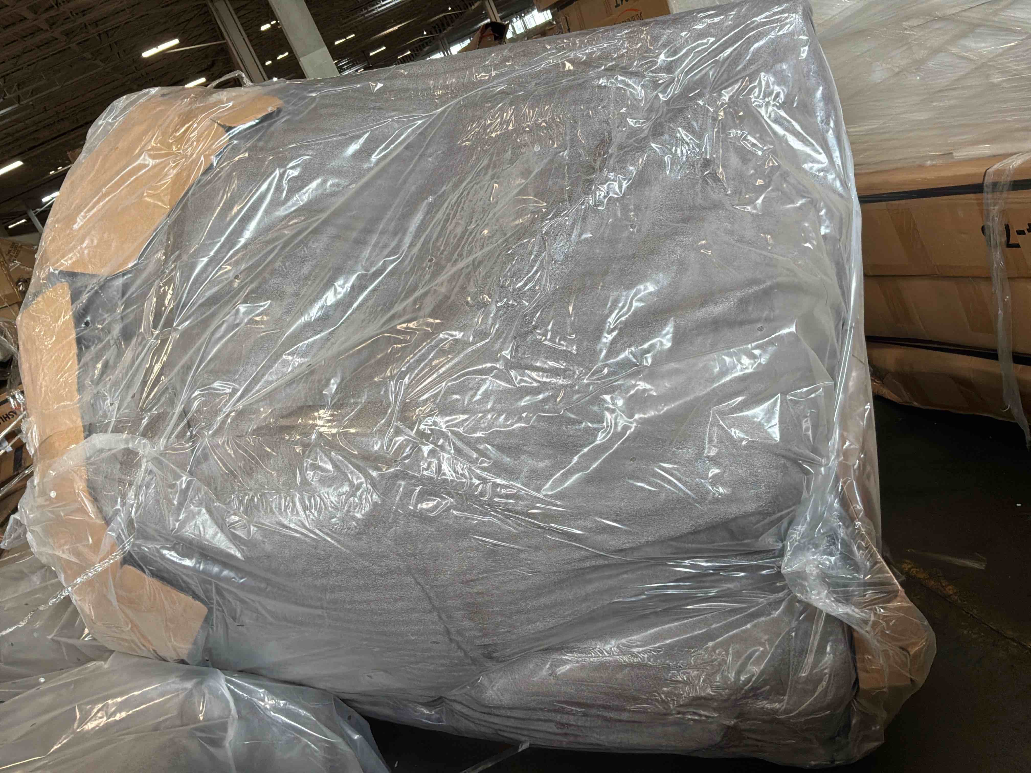 Condition photo showing As Is for ardsley armless loveseat