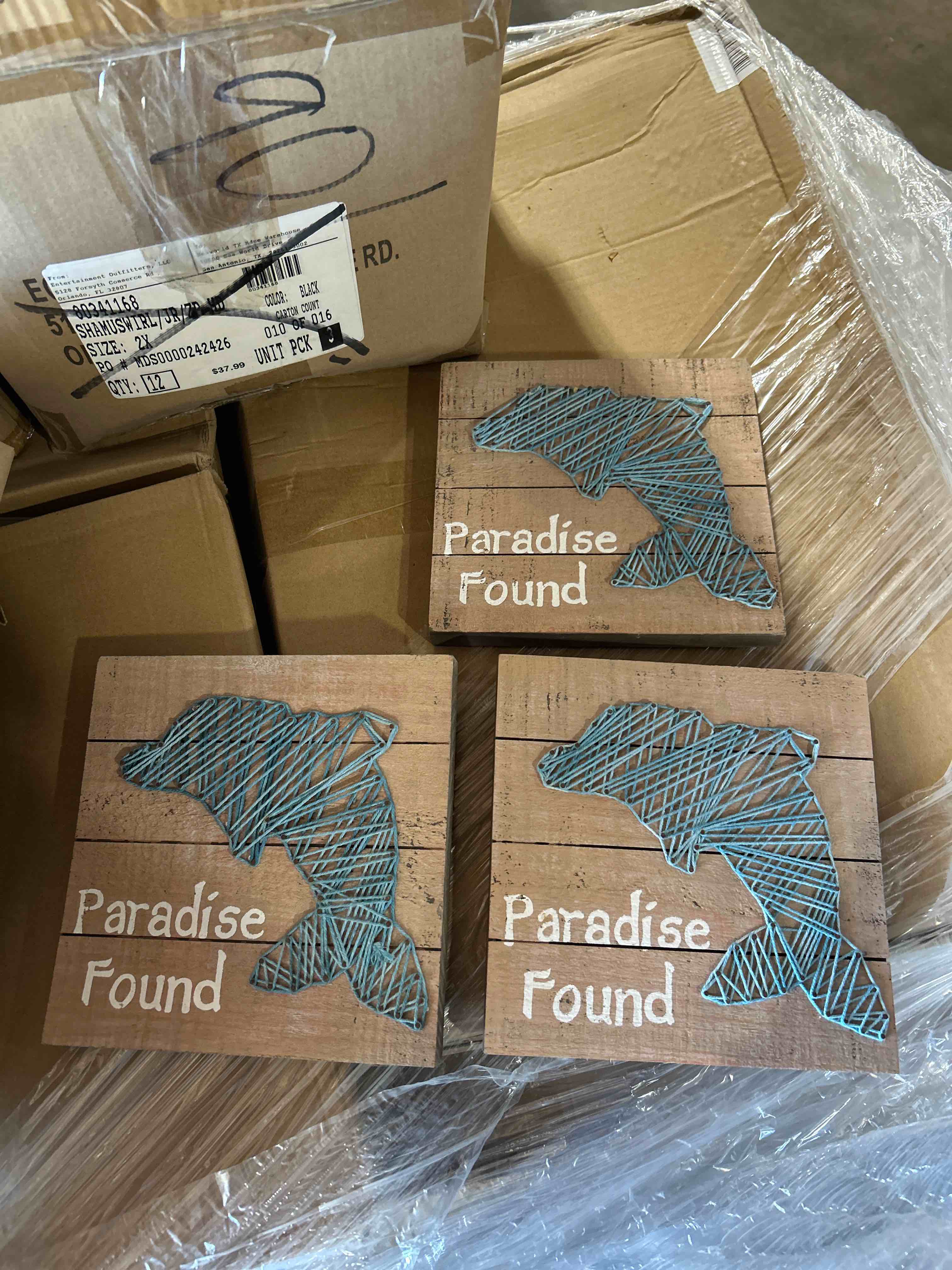 A lot of three Paradise found dolphin plaques