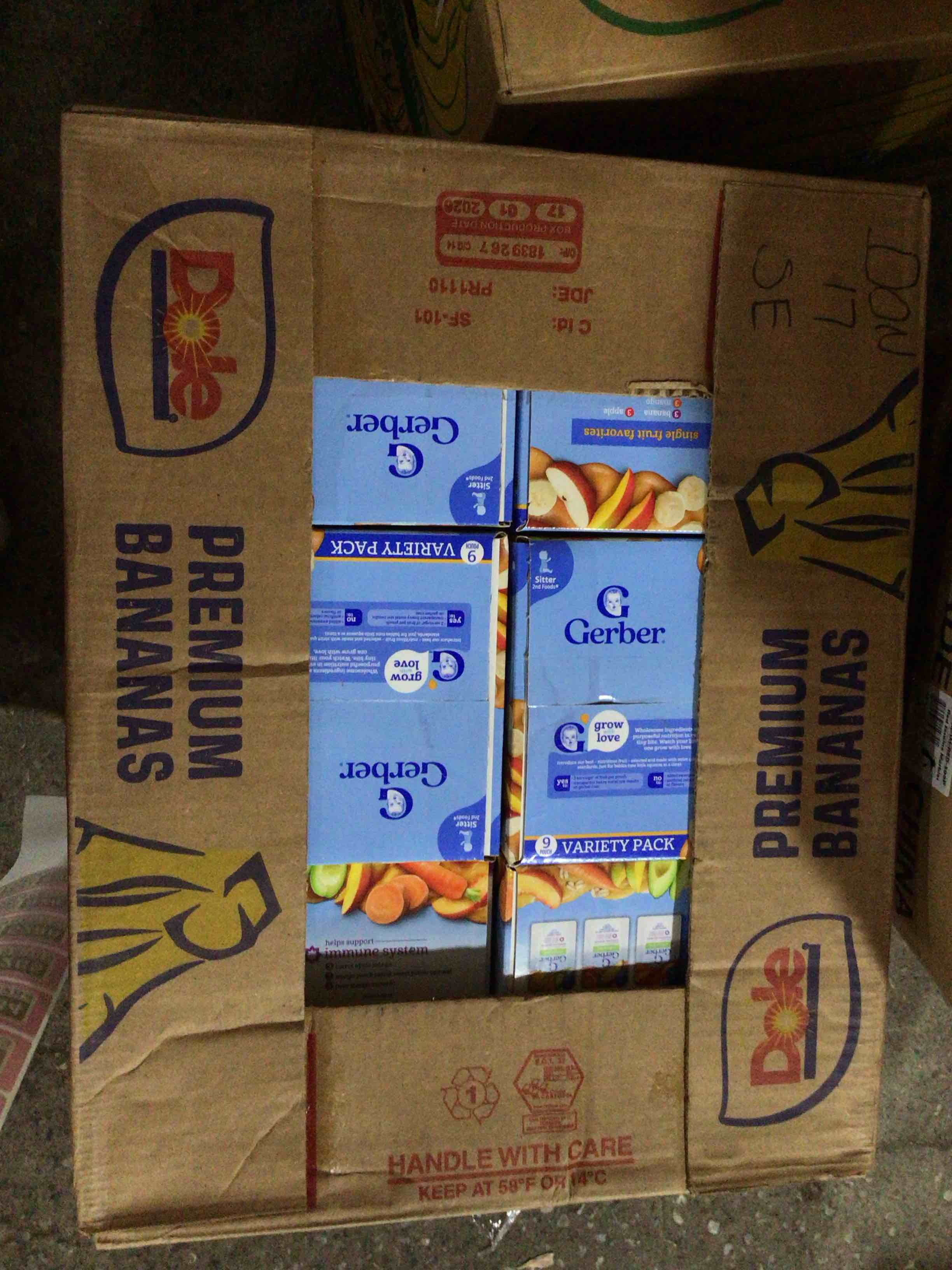 Condition photo showing Good Condition for box of assorted grocery products / baby food / snacks