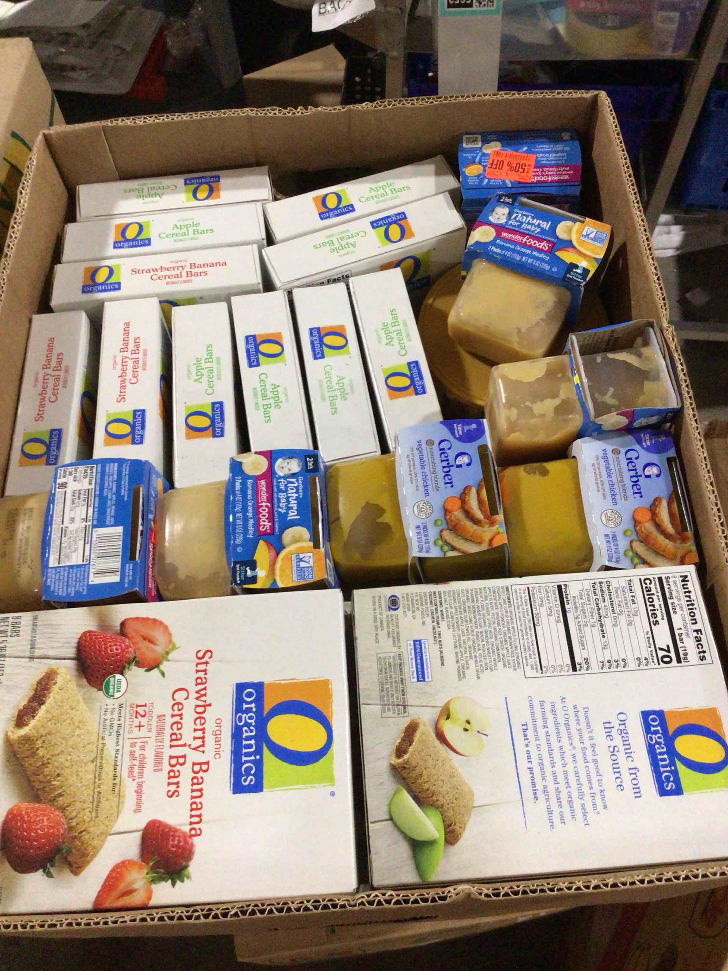 box of assorted grocery products / baby food / snacks