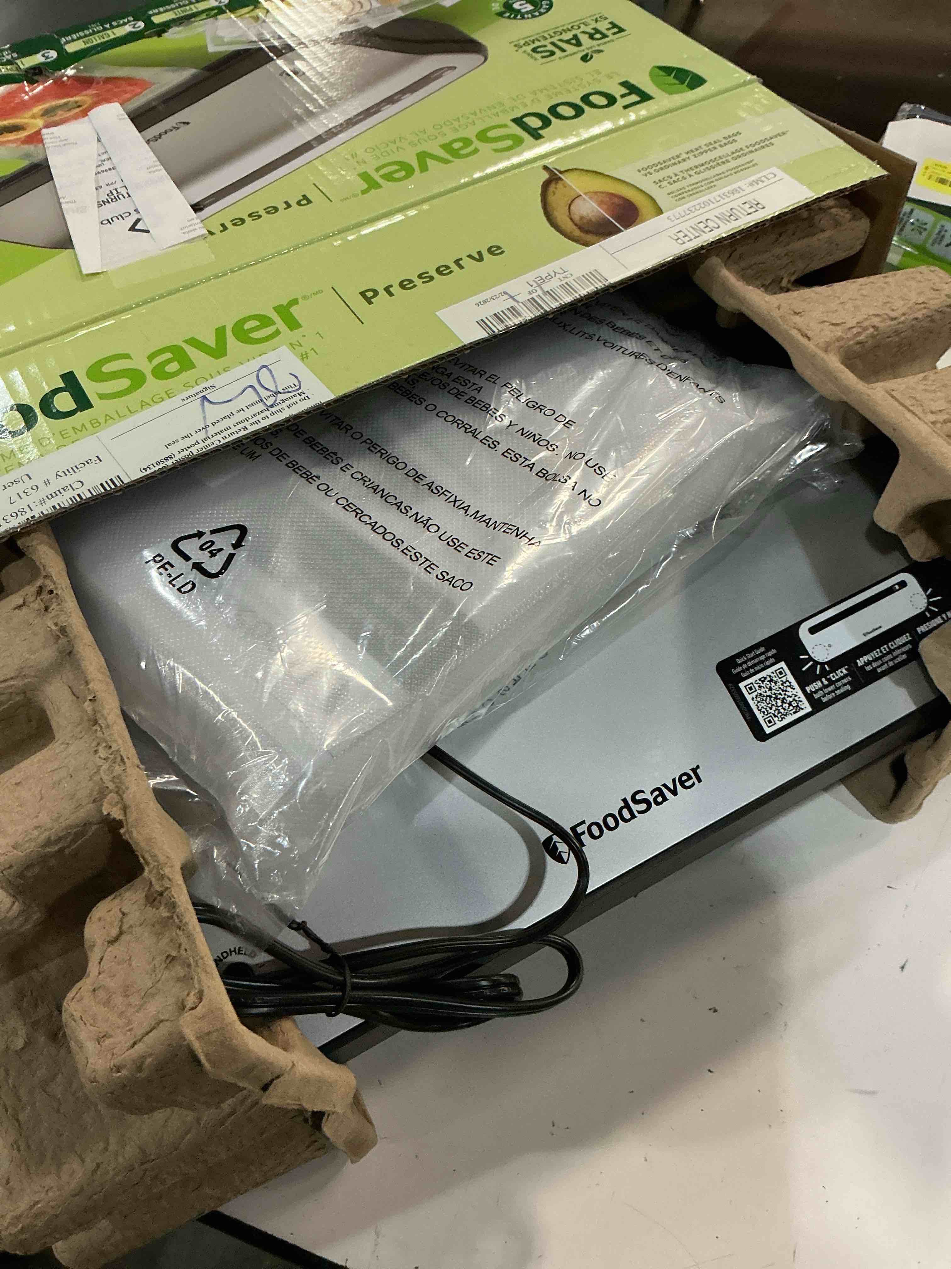 Condition photo showing Good Condition for  foodsaver 14-piece starter kit with vacuum seal roll and bags