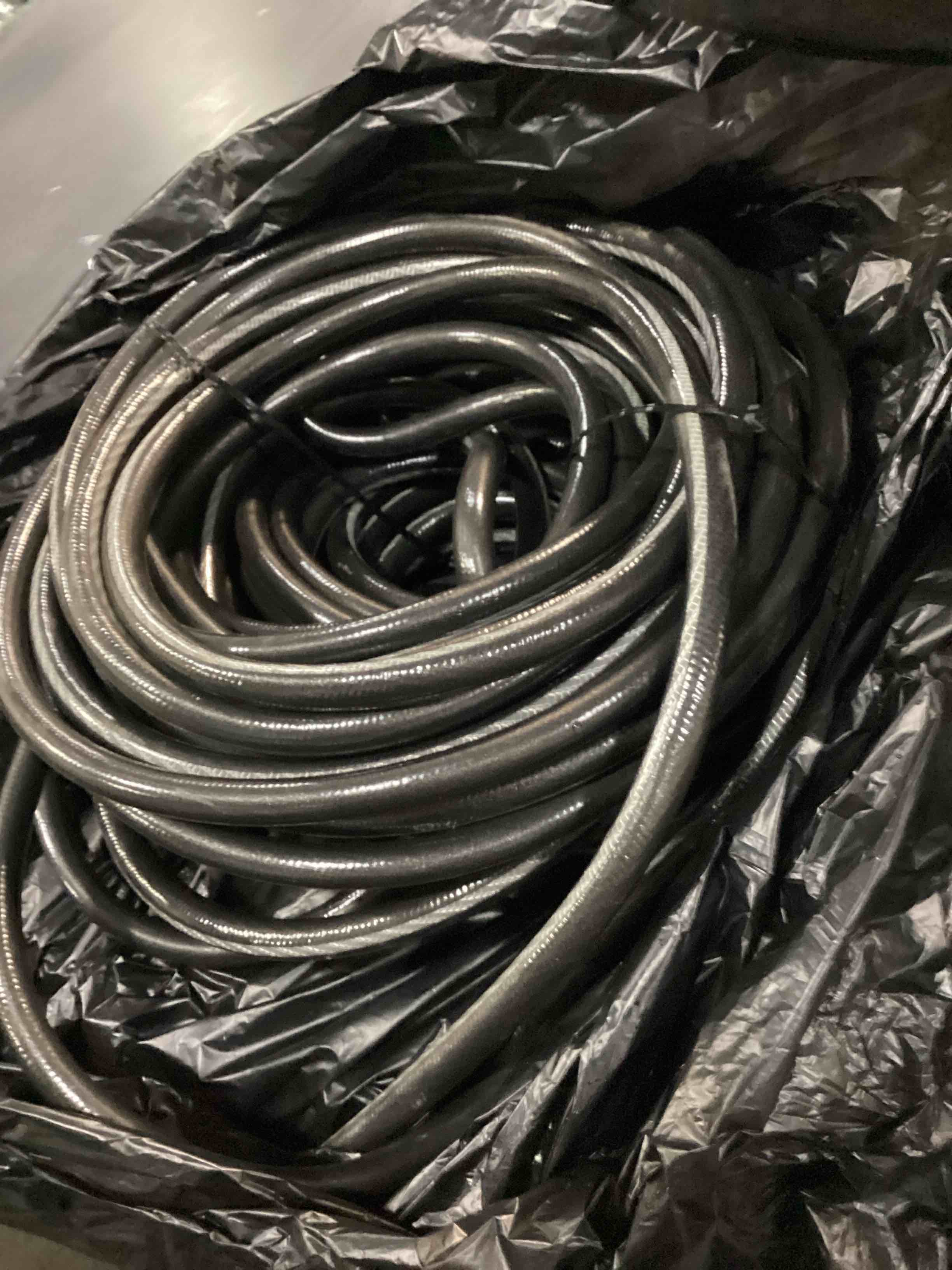 Condition photo showing As Is for neverkink teknor apex 5/8-in x 125-ft heavy -duty kink free vinyl green coiled hose