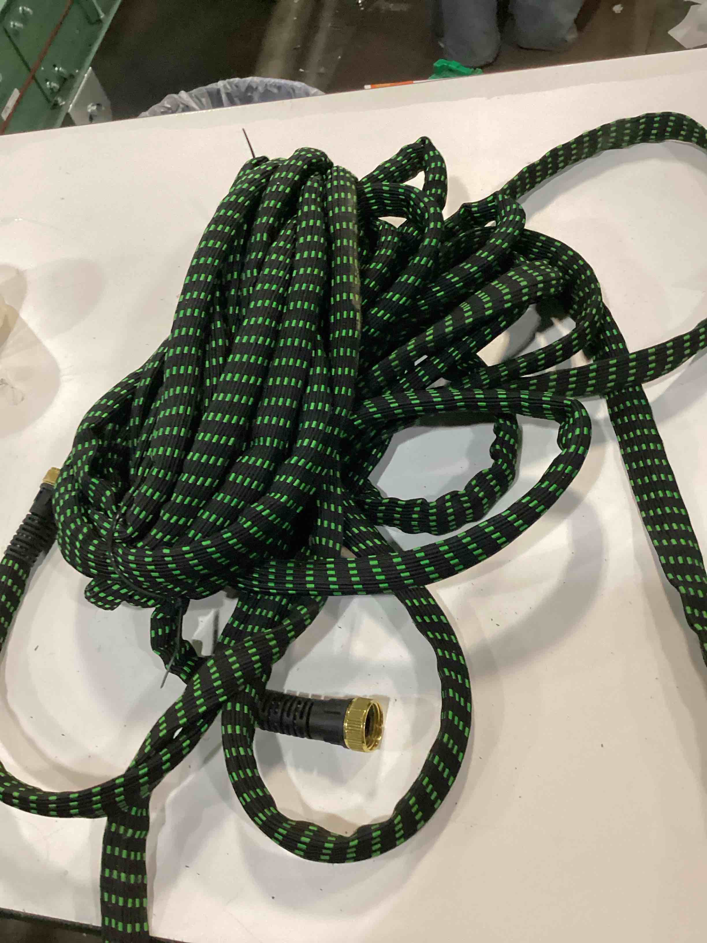 Condition photo showing As Is for flex-able hose xtreme 1-in x 100-ft kink free woven green hose