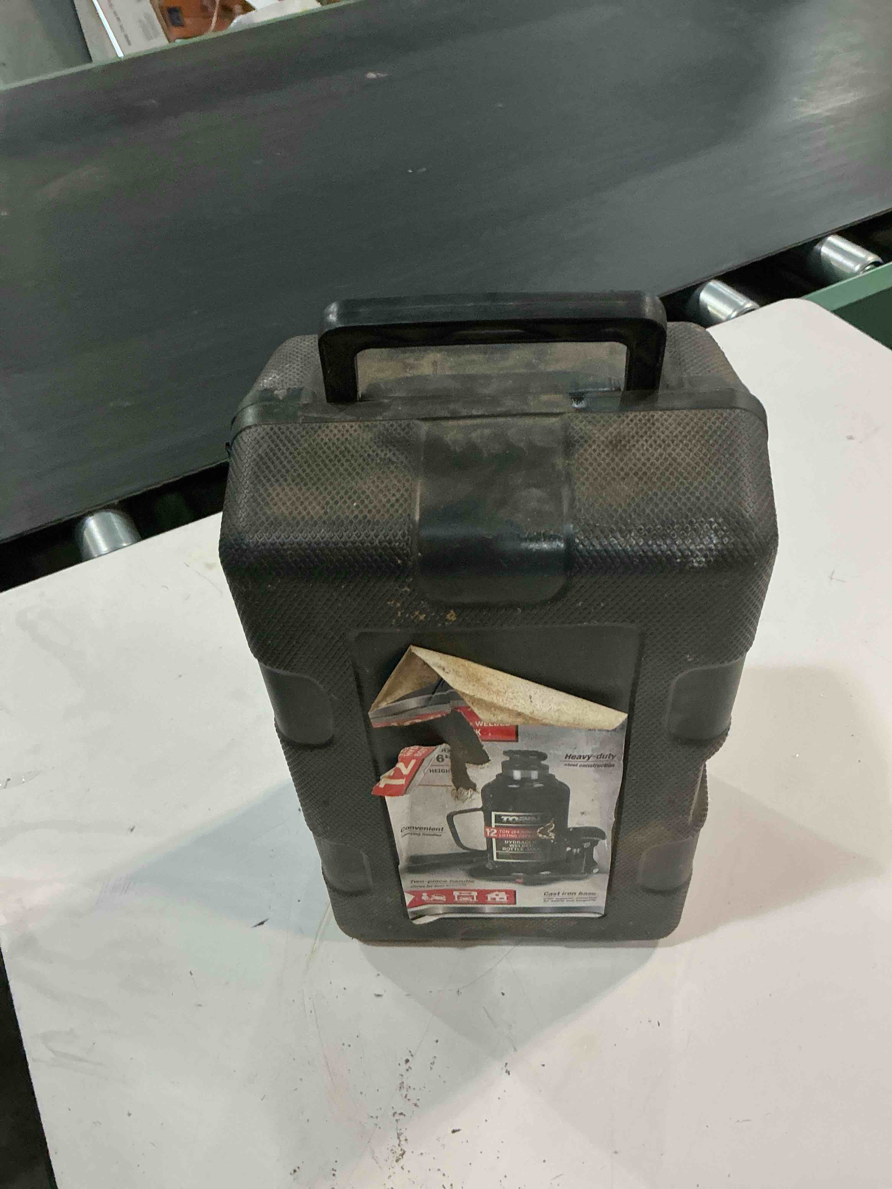 Condition photo showing As Is for torin black 12-ton steel hydraulic bottle jack