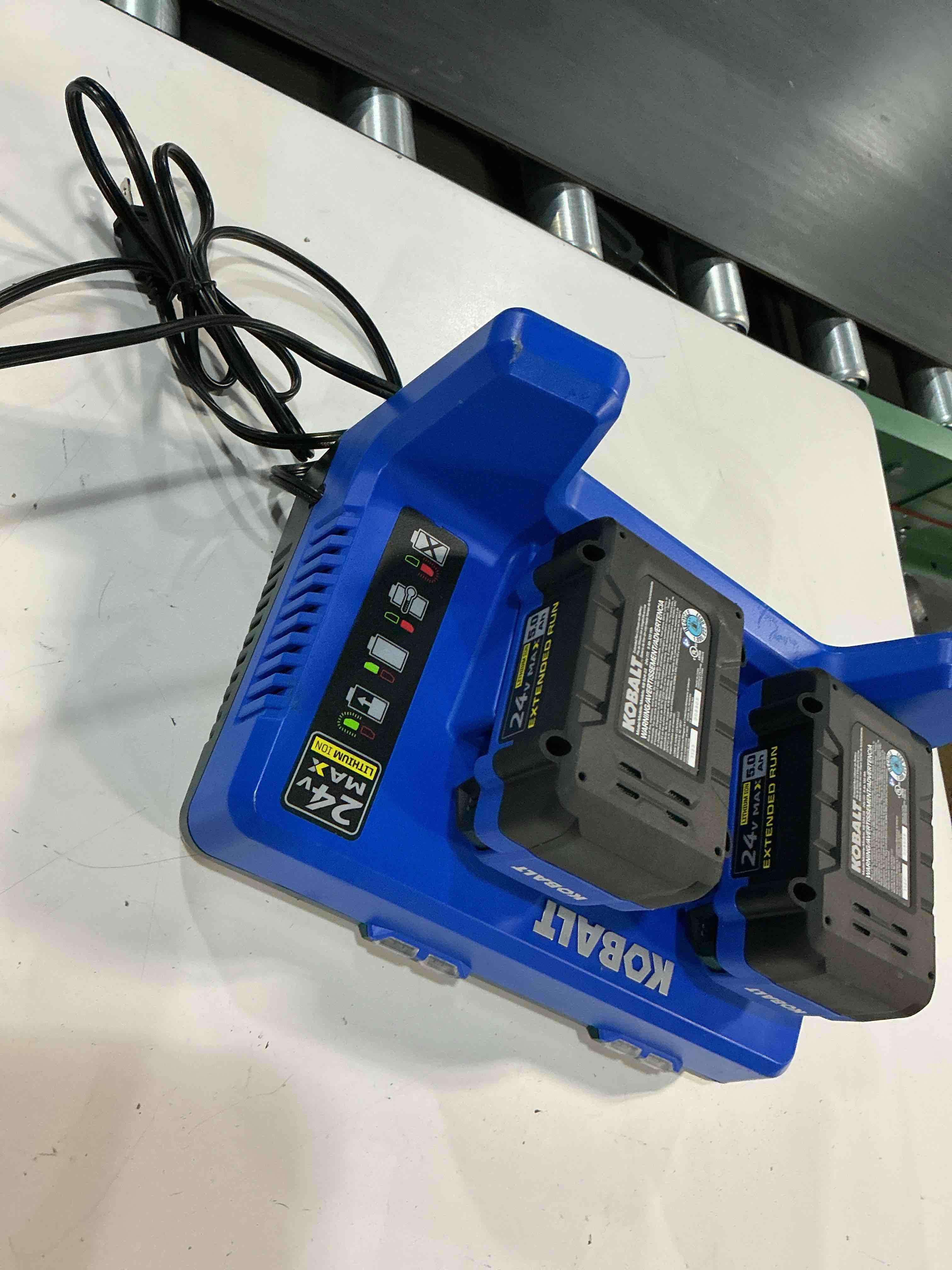 Condition photo showing As Is for kobalt 24v power tool charger with batteries for kobalt tools