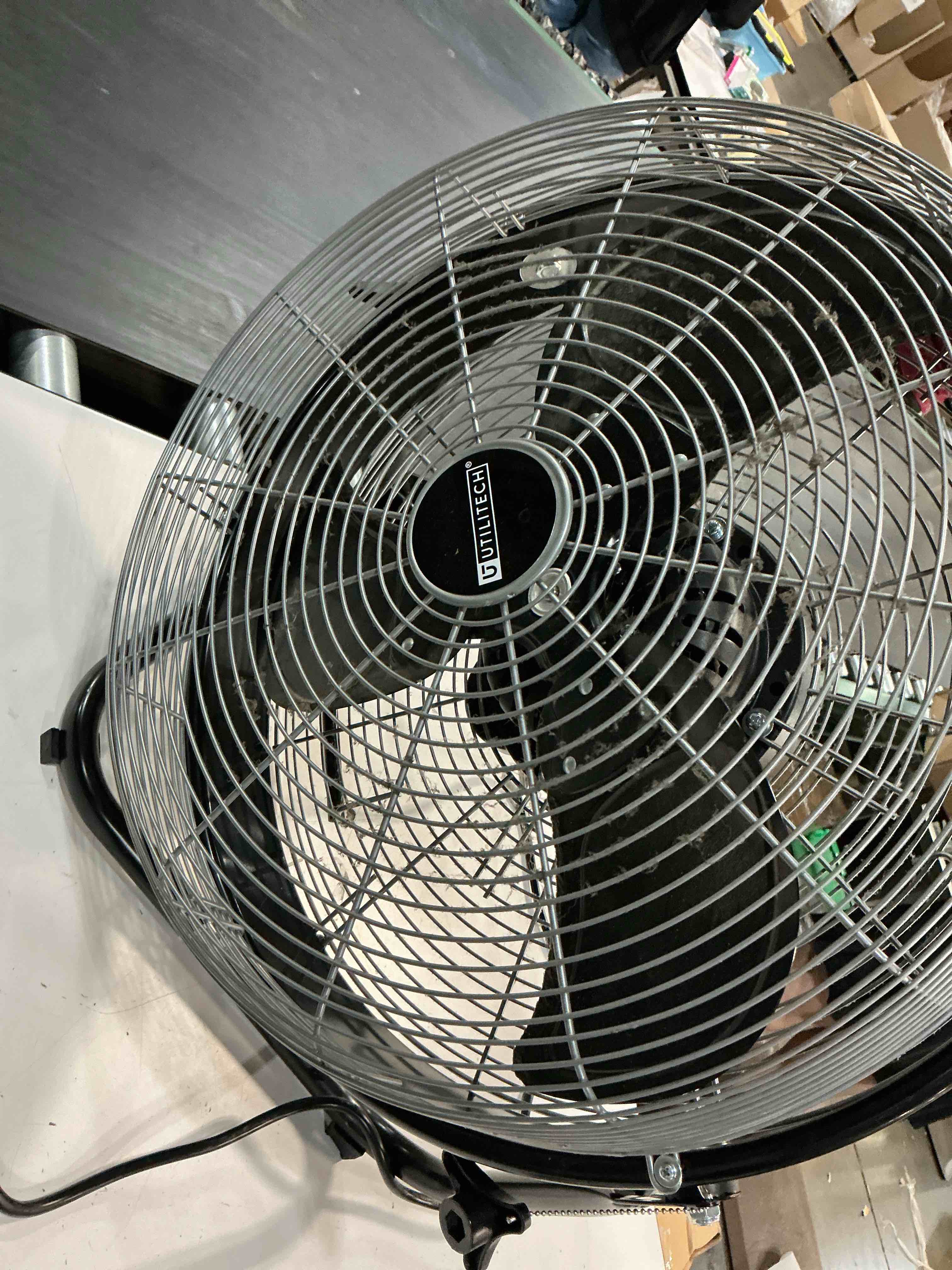 Condition photo showing As Is for utilitech 18-in high velocity indoor oscillating floor fan, in black