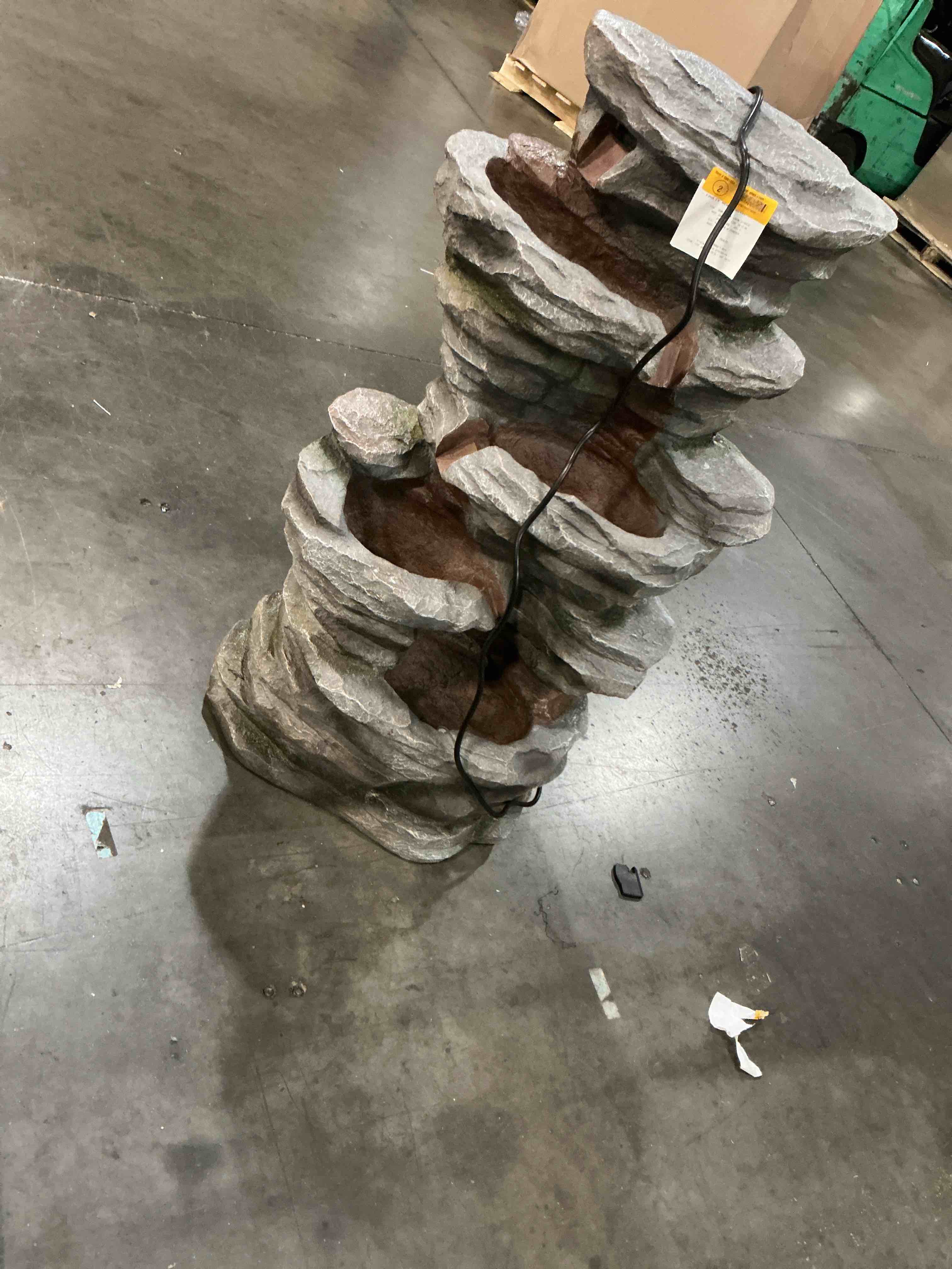 Condition photo showing As Is for alpine corporation 39-in h resin tiered outdoor fountain pump included