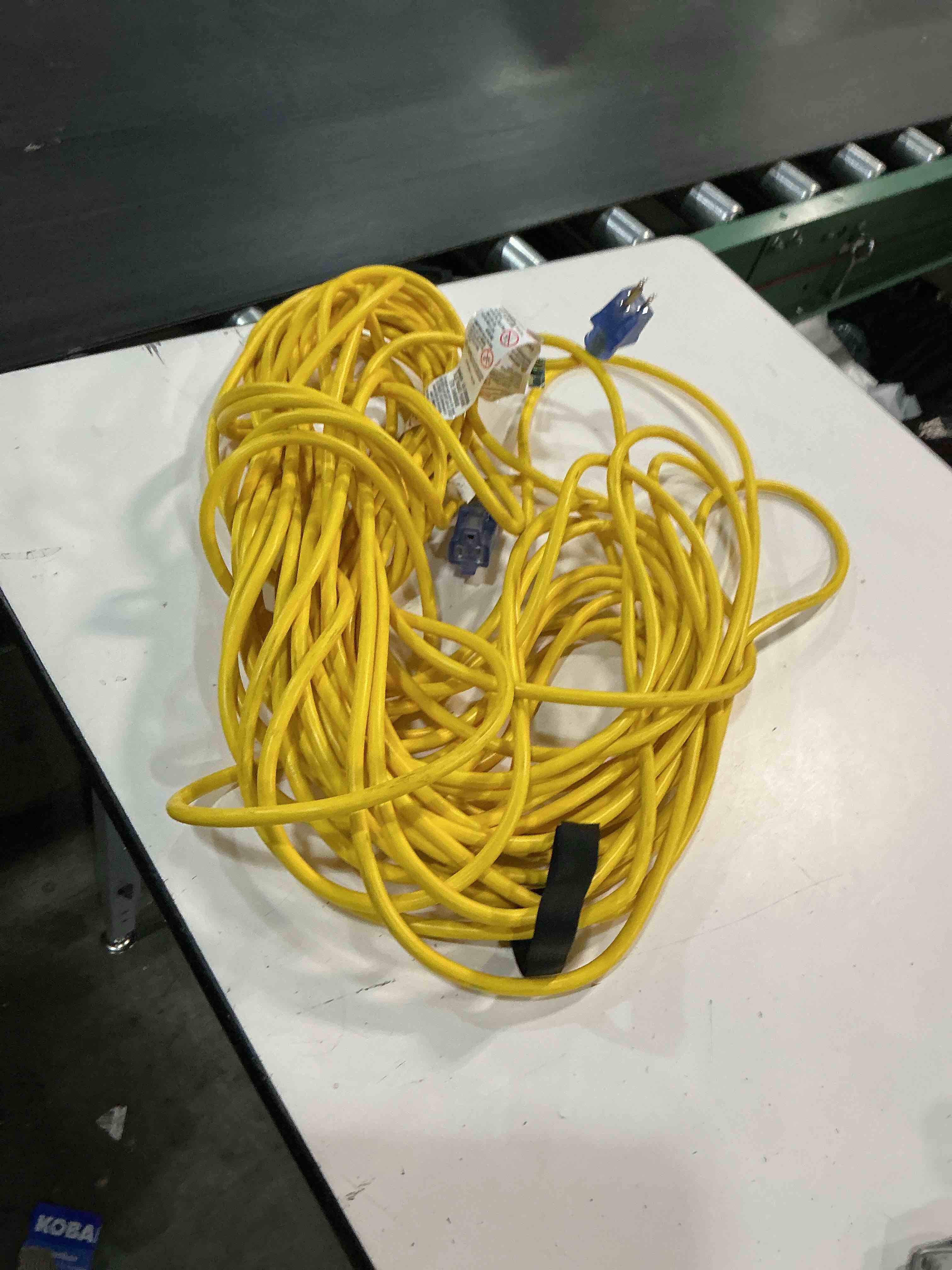 Condition photo showing As Is for powgrn 100 ft 12/3 outdoor extension cord waterproof heavy duty with lighted indicator end 12 gauge 3 prong, flexible cold-resistant long power cord outside, 15amp 1875w sjtw yellow etl listed 100ft 12/3 extension cord yellow