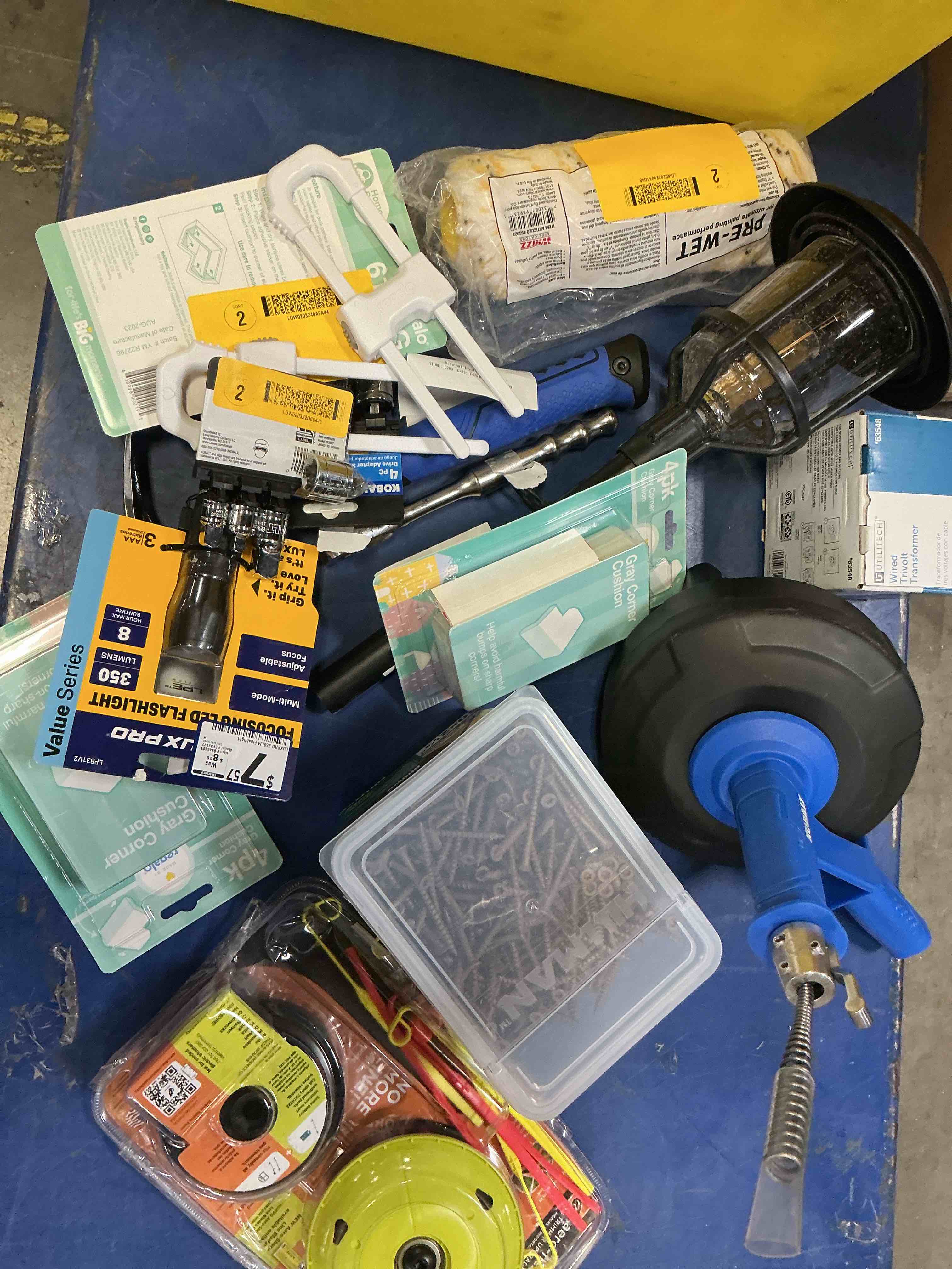 Condition photo showing As Is for assorted home improvement lot (small tools, screw, home accessories, etc.)