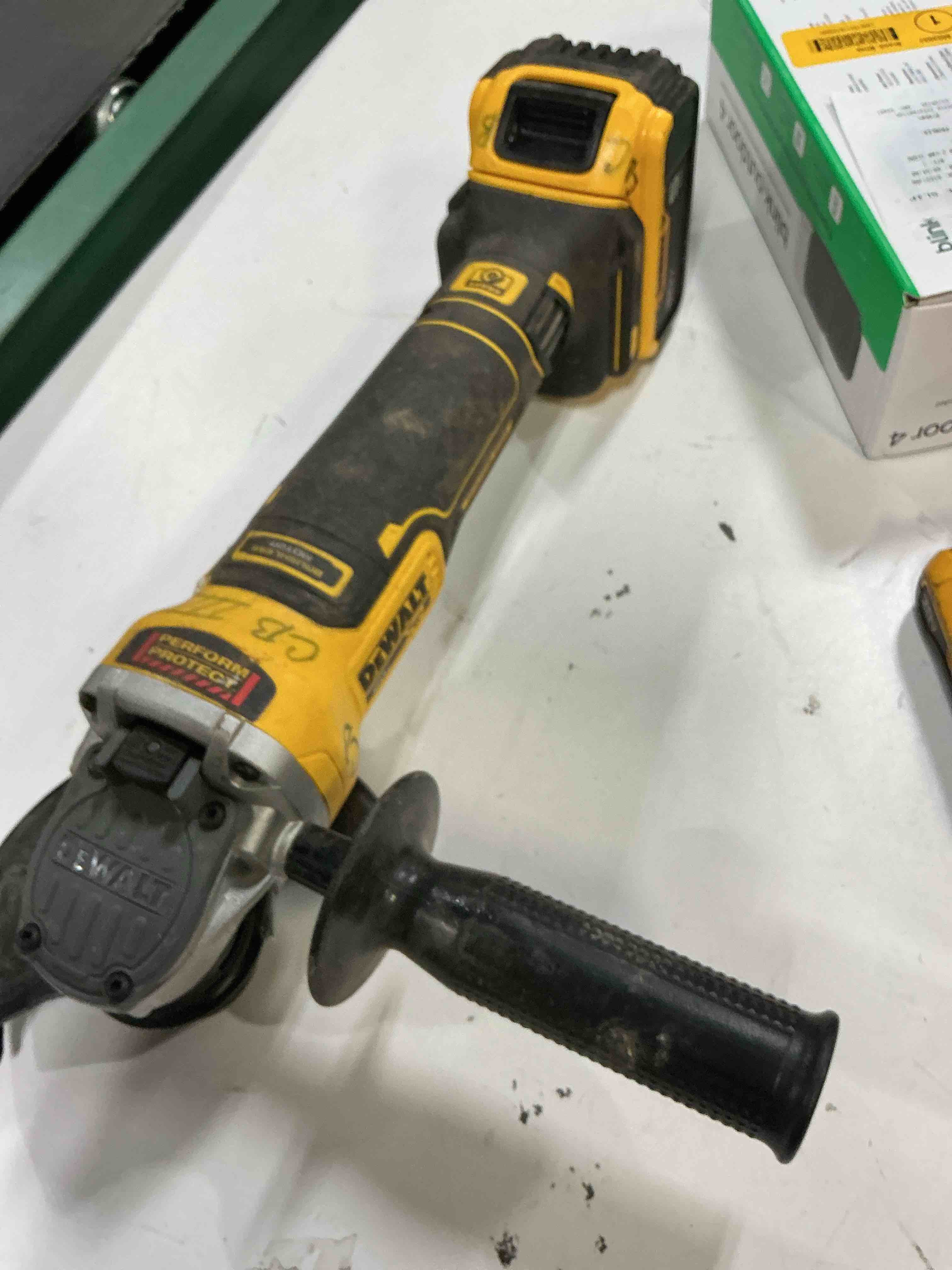 Condition photo showing As Is for dewalt xr 4.5-in 20-volt max paddle switch brushless cordless angle grinder