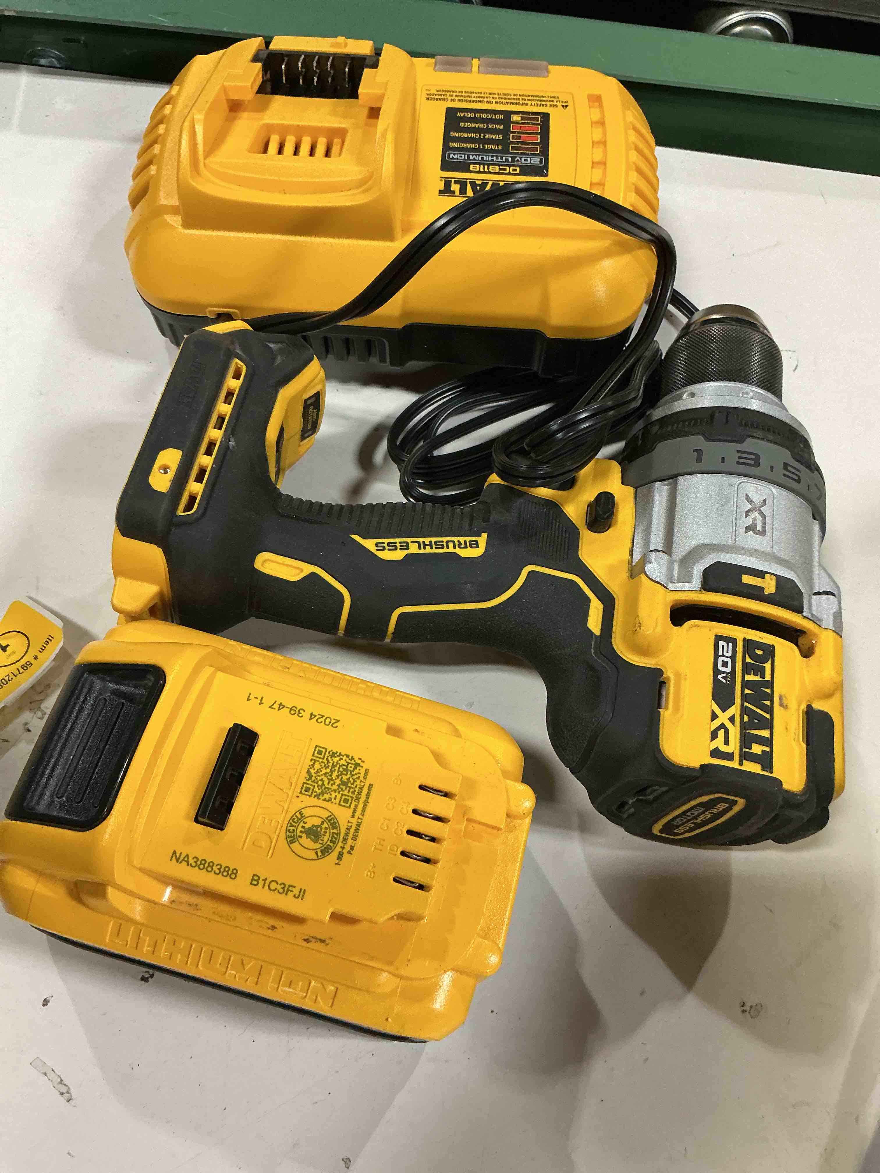 Condition photo showing As Is for dewalt 20-volt max 1/2-in keyless brushless cordless drill ( 2 -batteries included, and charger