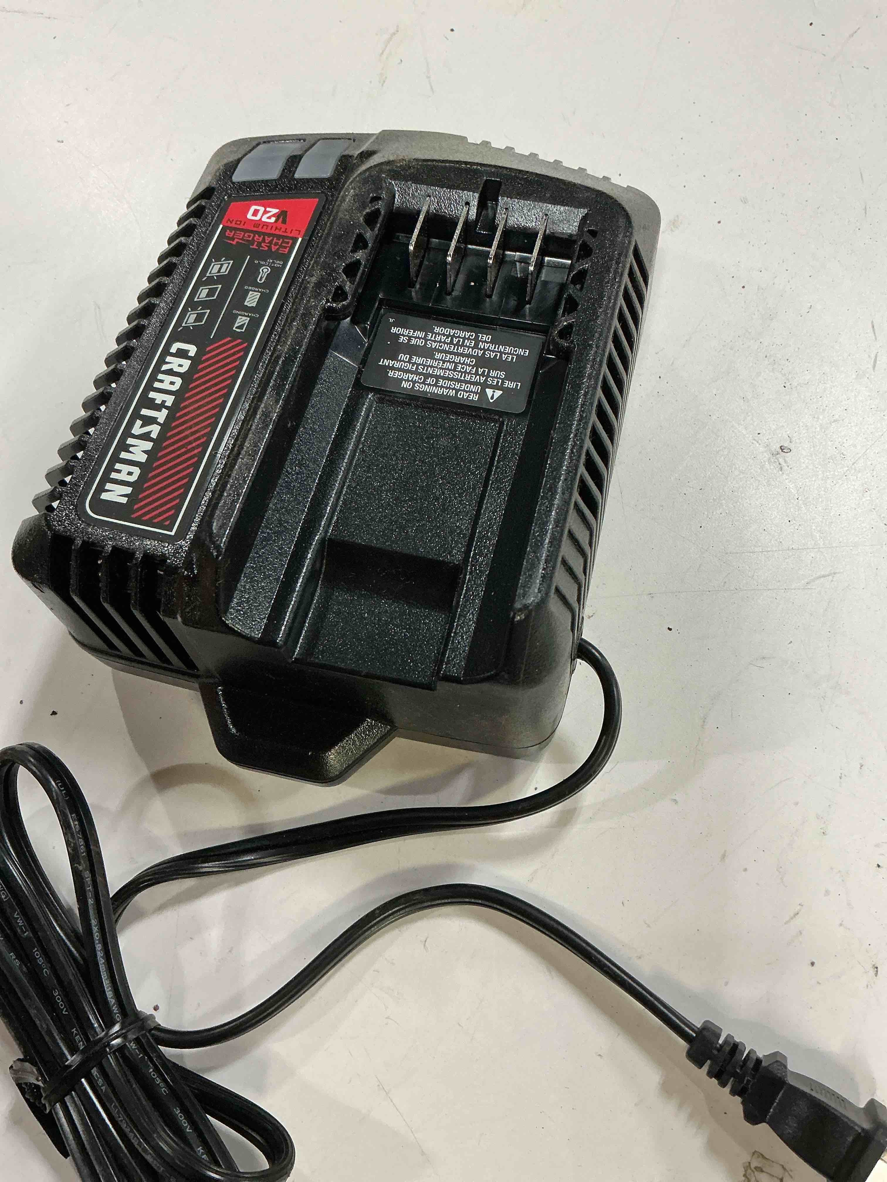 Condition photo showing As Is for craftsman v20 20 -volt 2 -pack lithium-ion ( 4 ah 2 ah battery and charger )