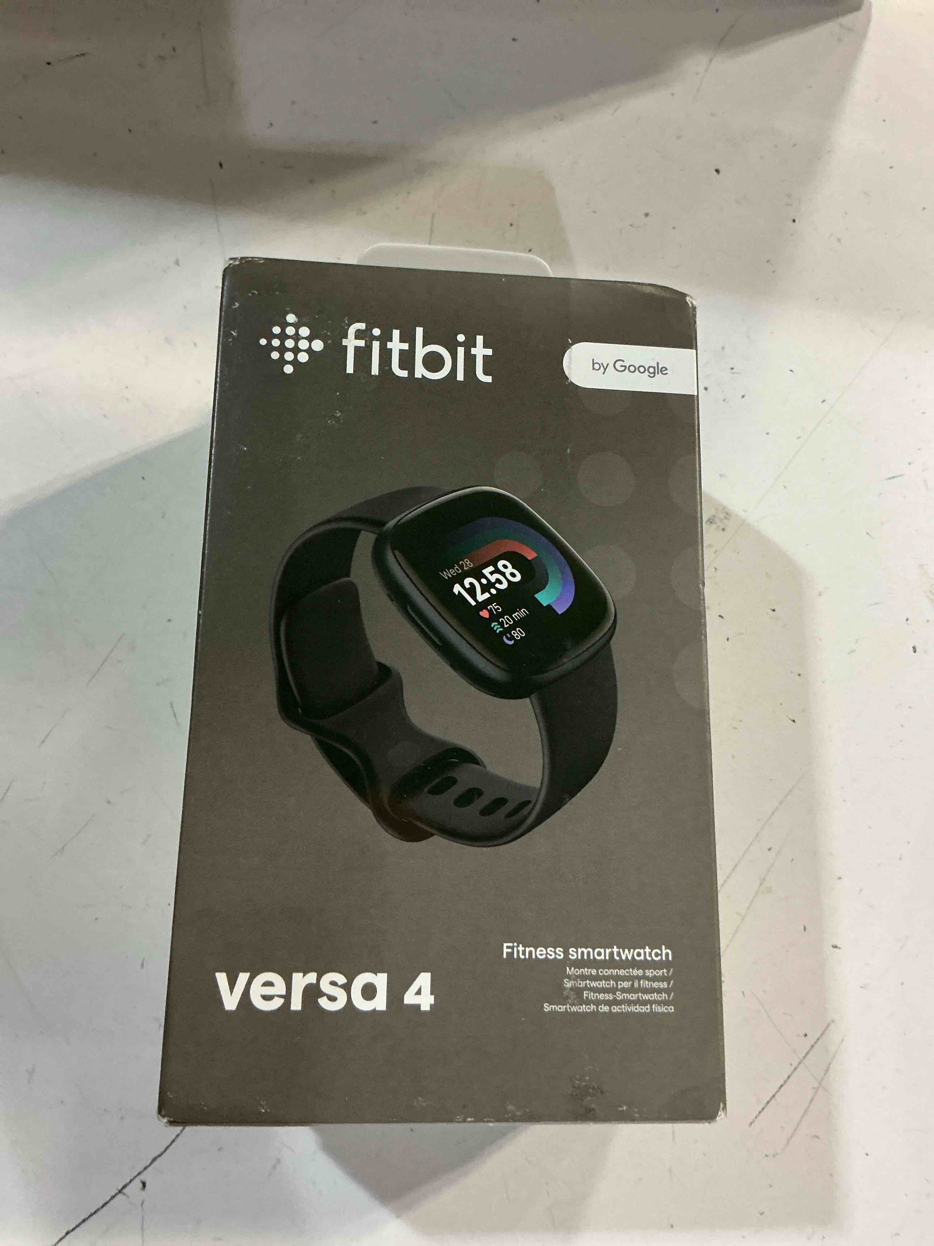 Condition photo showing Good Condition for fitbit versa 4 fitness smartwatch with daily readiness, gps, 24/7 heart rate, 40+ exercise modes, sleep tracking and more, black/graphite, one size (s & l bands included)