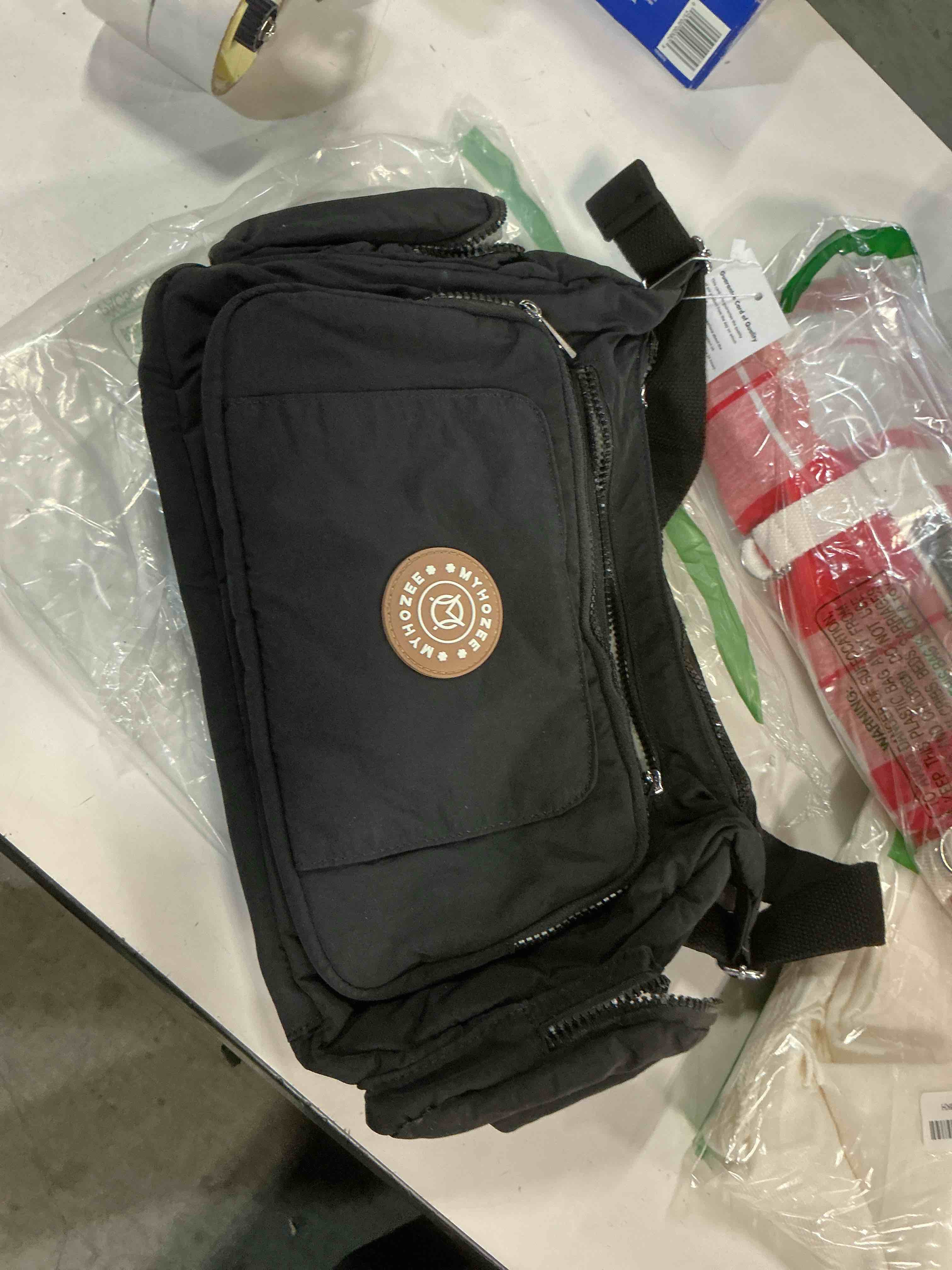 Condition photo showing New/Like New for black puffer crossbody bags for women mom large diaper bag purse with wipes & trash dispenser cross body purses messenger bags | wipes dispenser, trash dispenser, lightweight, 22l large capacity, lots of pockets, baby stroller strap black