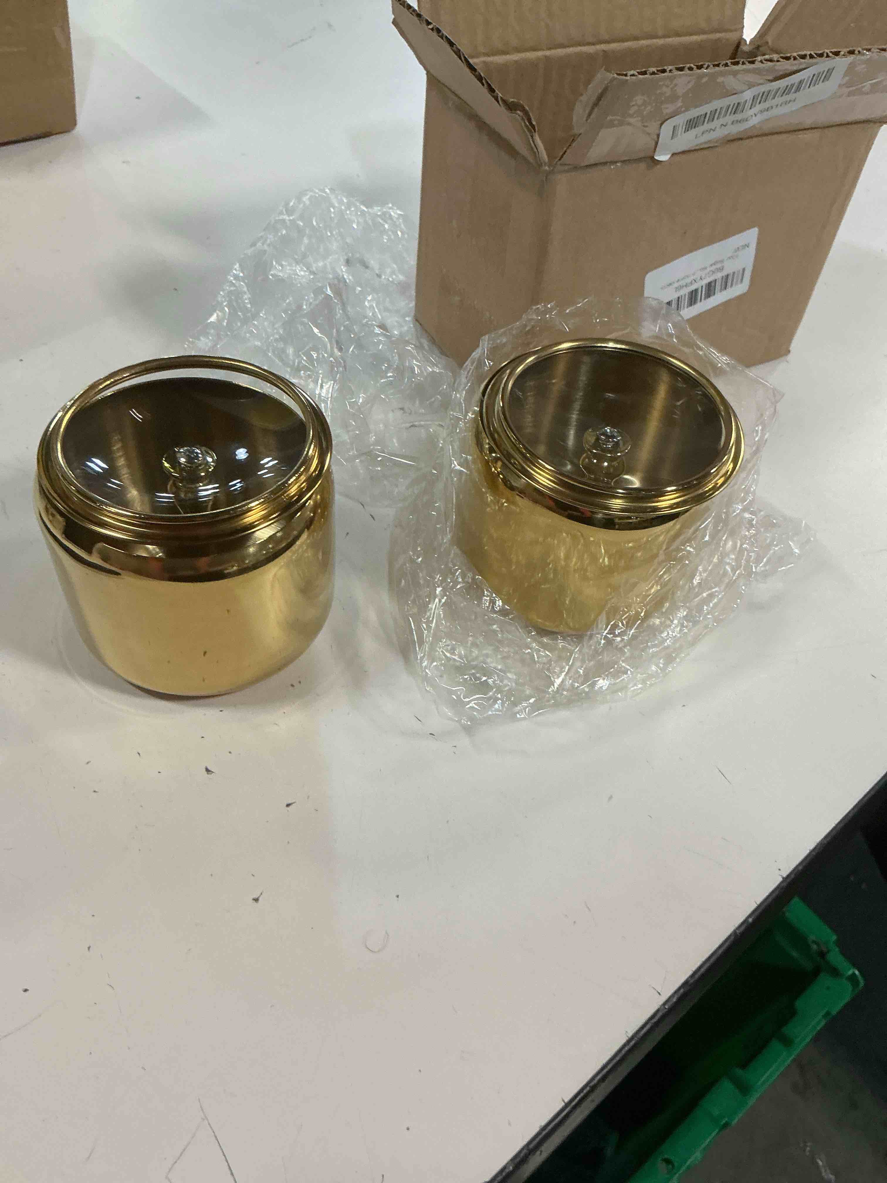 Condition photo showing As Is for 10oz sugar bowl 2-pack with lid|gold coffee bar sugar container, includes 2 stainless steel canisters with clear lids. this perfect for kitchen countertop, seasoning storage, and stylish home decor.