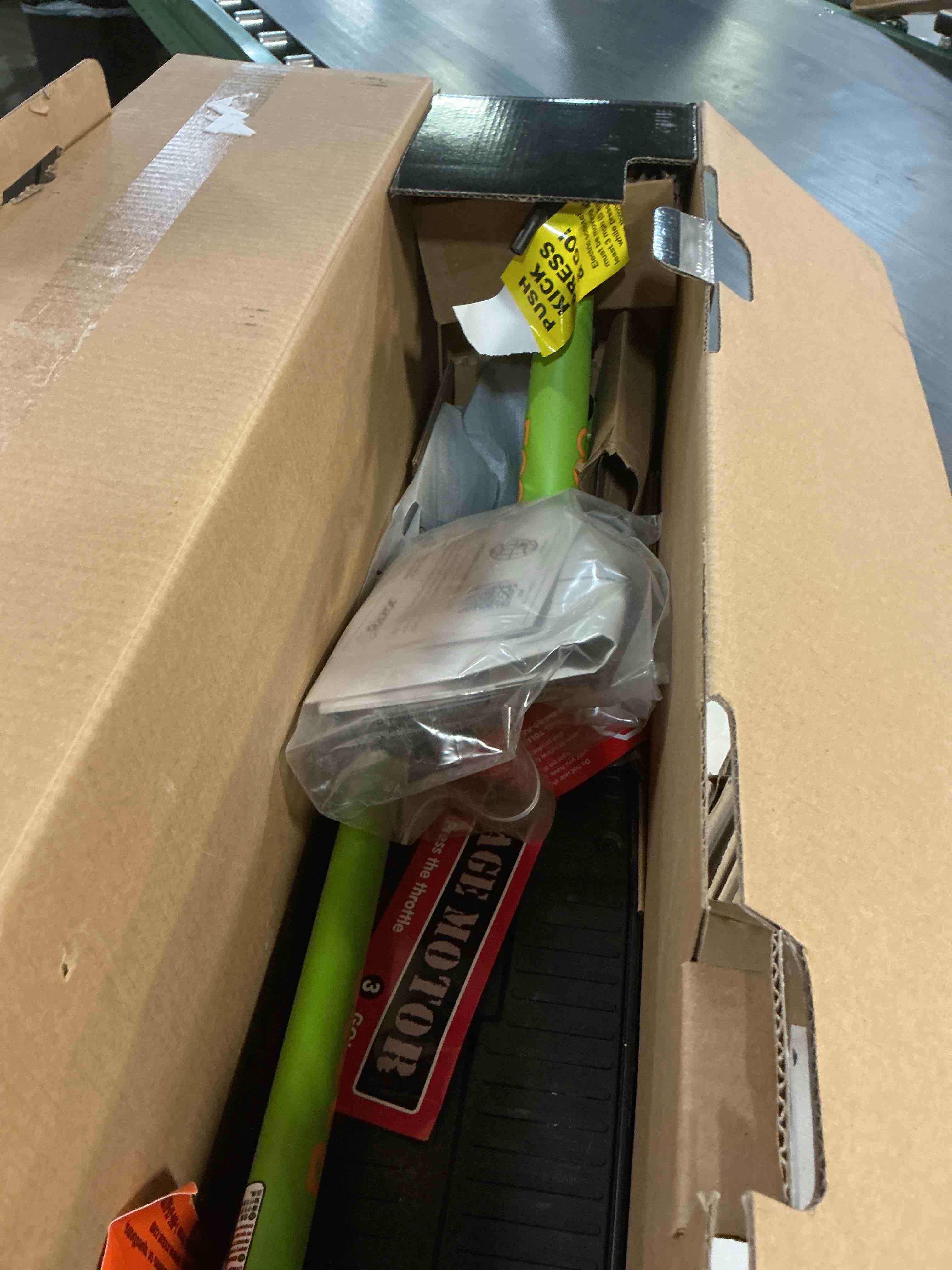 Condition photo showing As Is for razor black label e90 electric scooter - green for child ages 8+ and up to 120 lbs up to 10 mph