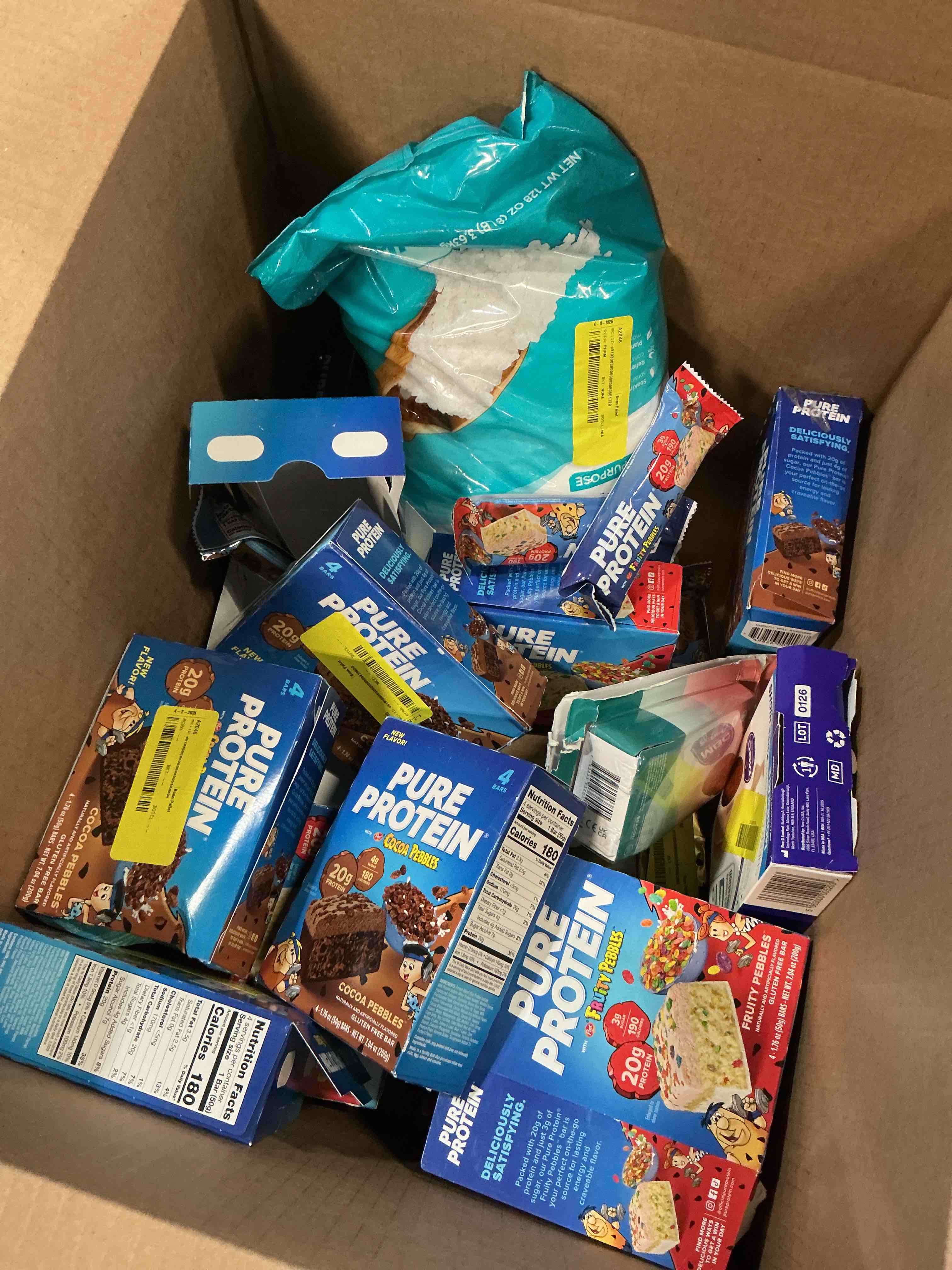 Condition photo showing As Is for assorted of different food products, snacks, drinks and other..(expiration date may vary)