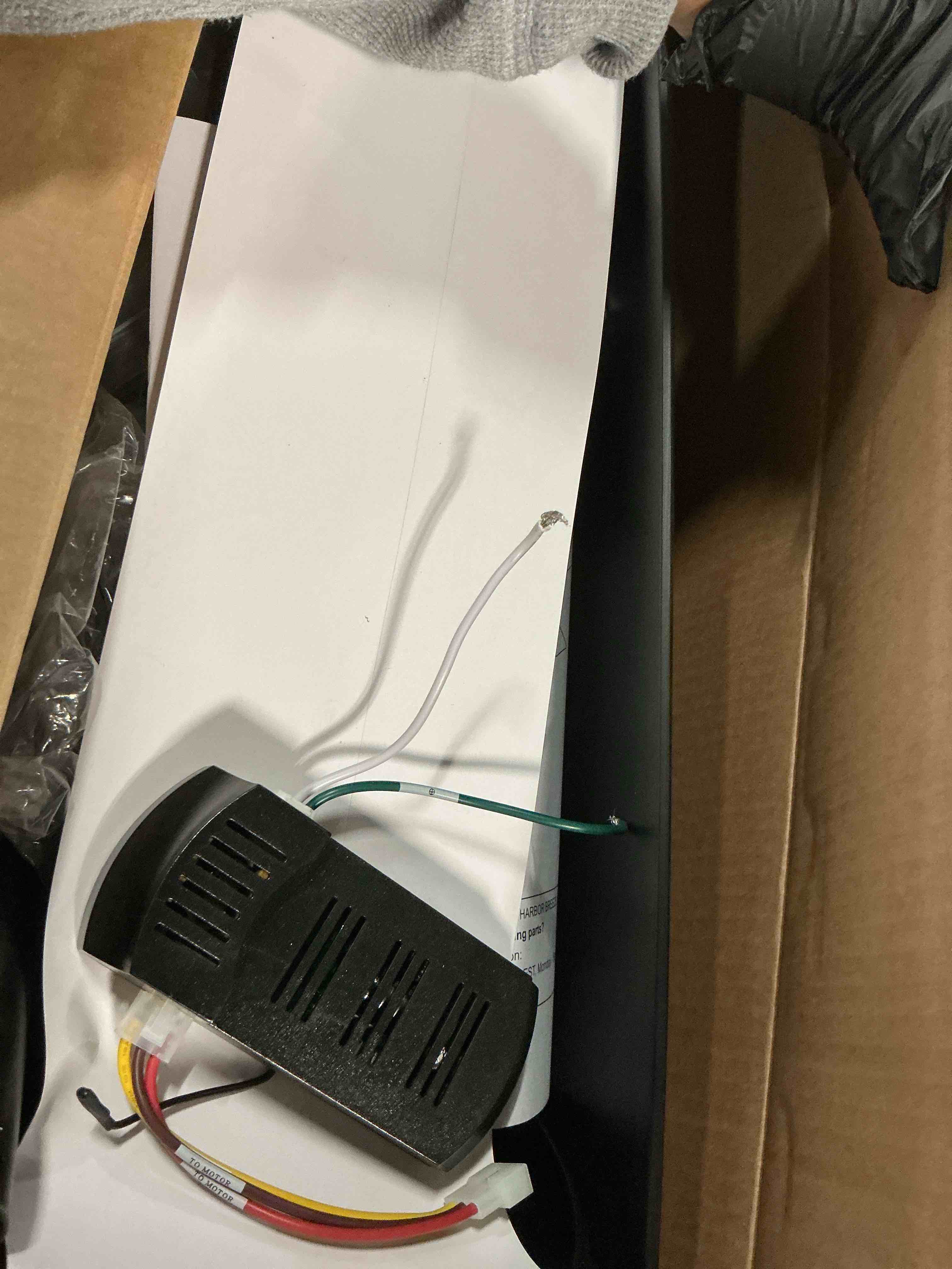 Condition photo showing As Is for harbor breeze stokes ii easy2hang 52-in matte black with matte black blades covered outdoor