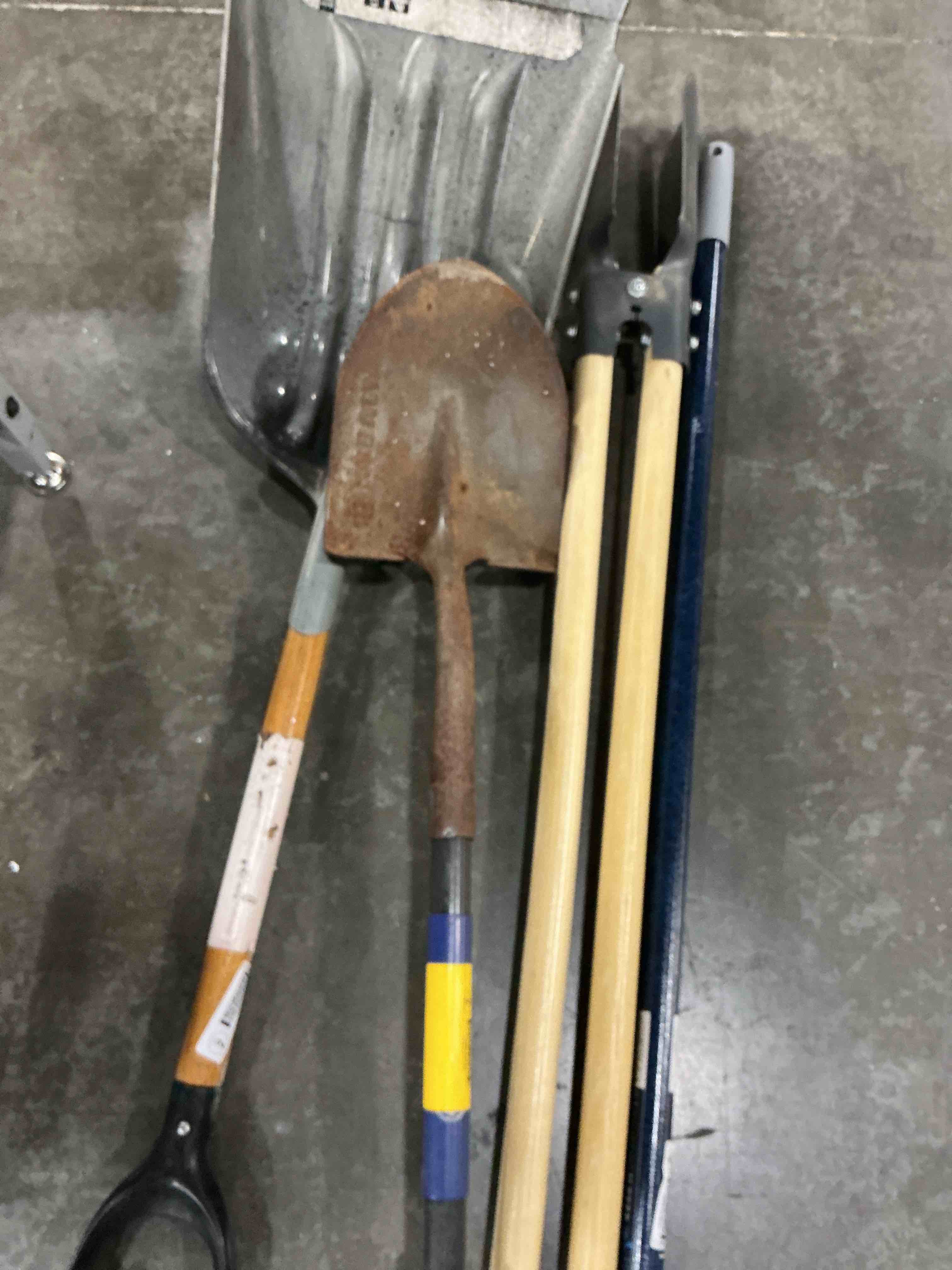 Condition photo showing As Is for garden tools