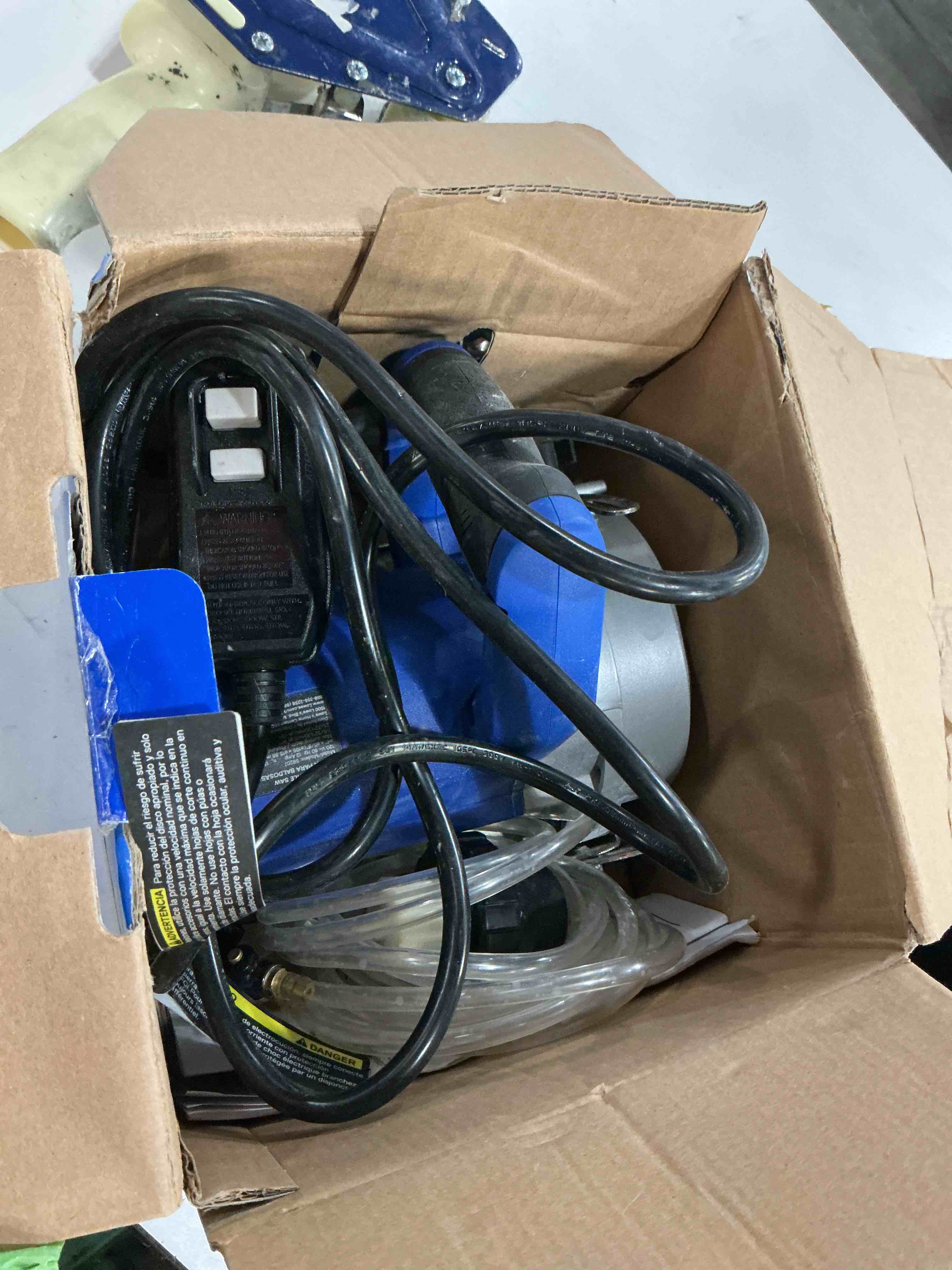 Condition photo showing As Is for  kobalt 24v 4-in -blade cordless handheld tile saw 