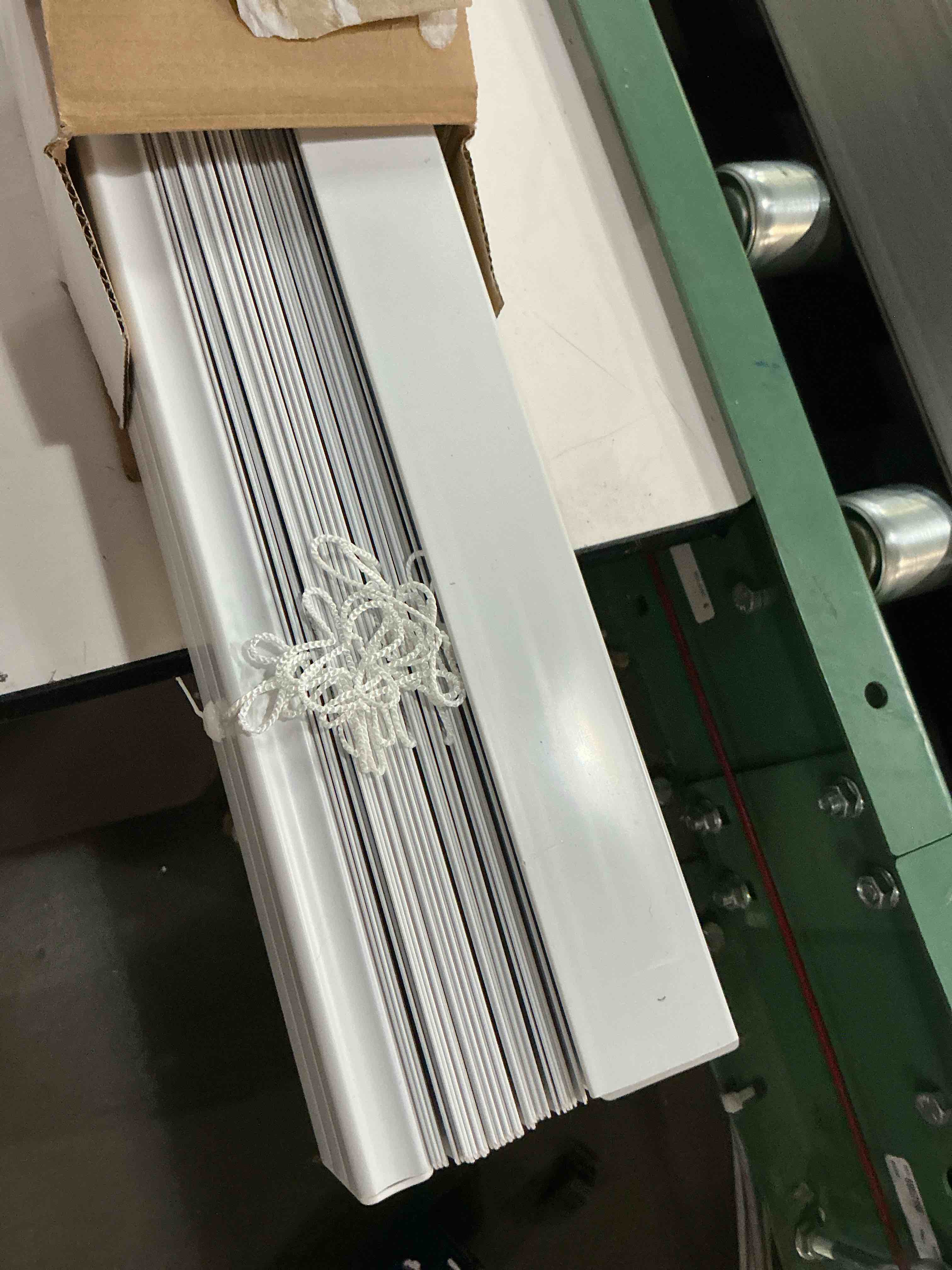 Condition photo showing As Is for project source premium 2-in slat width 29-in x 64-in cordless white vinyl room darkening plantation blinds