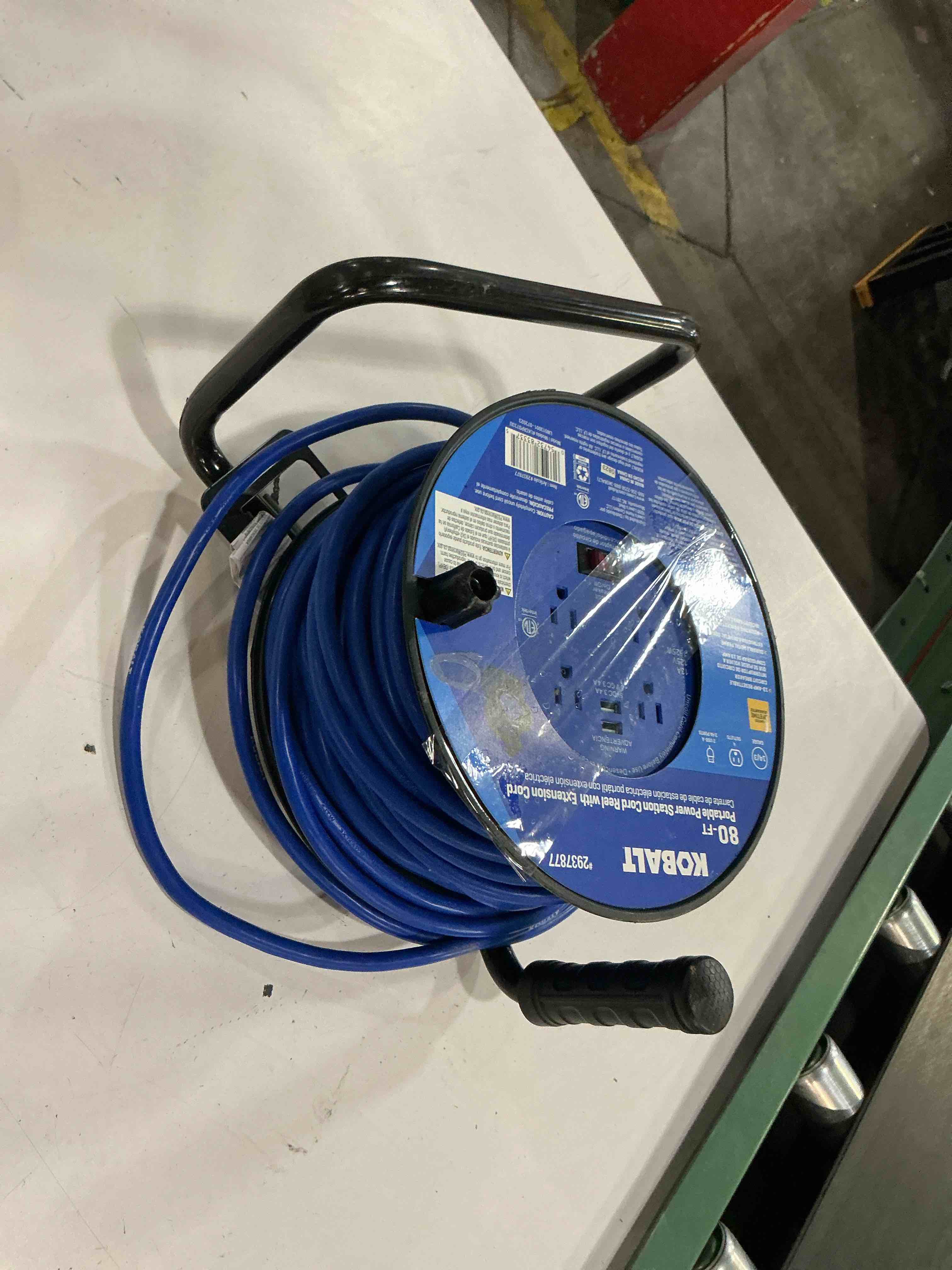 Condition photo showing As Is for  kobalt 4-outlet kobalt black/blue cord reel 2-usb w/80ft 14/3 sjtw ext cord