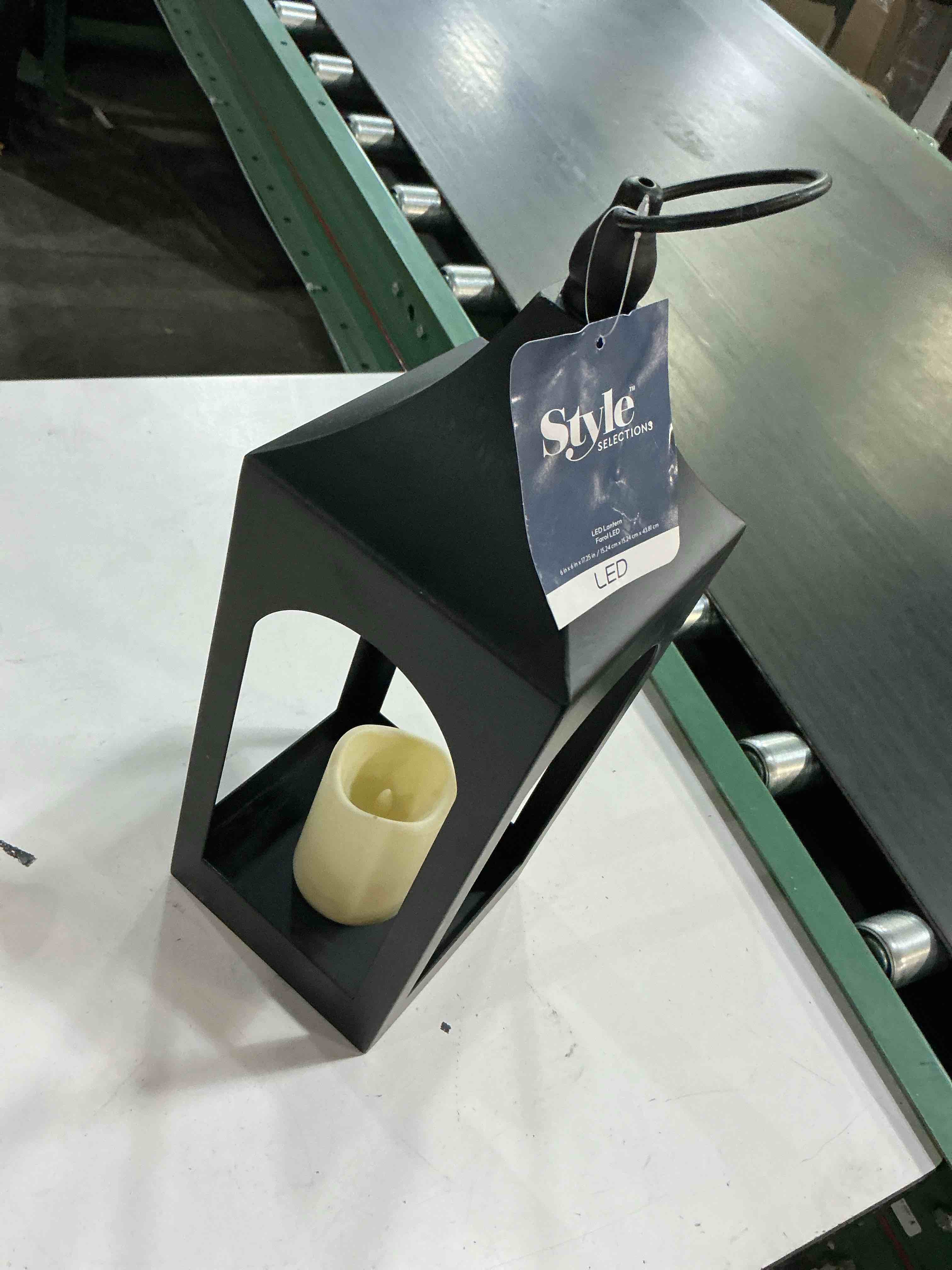 Condition photo showing As Is for  style selections 6.1-in x 17.72-in black metal led light outdoor decorative lantern