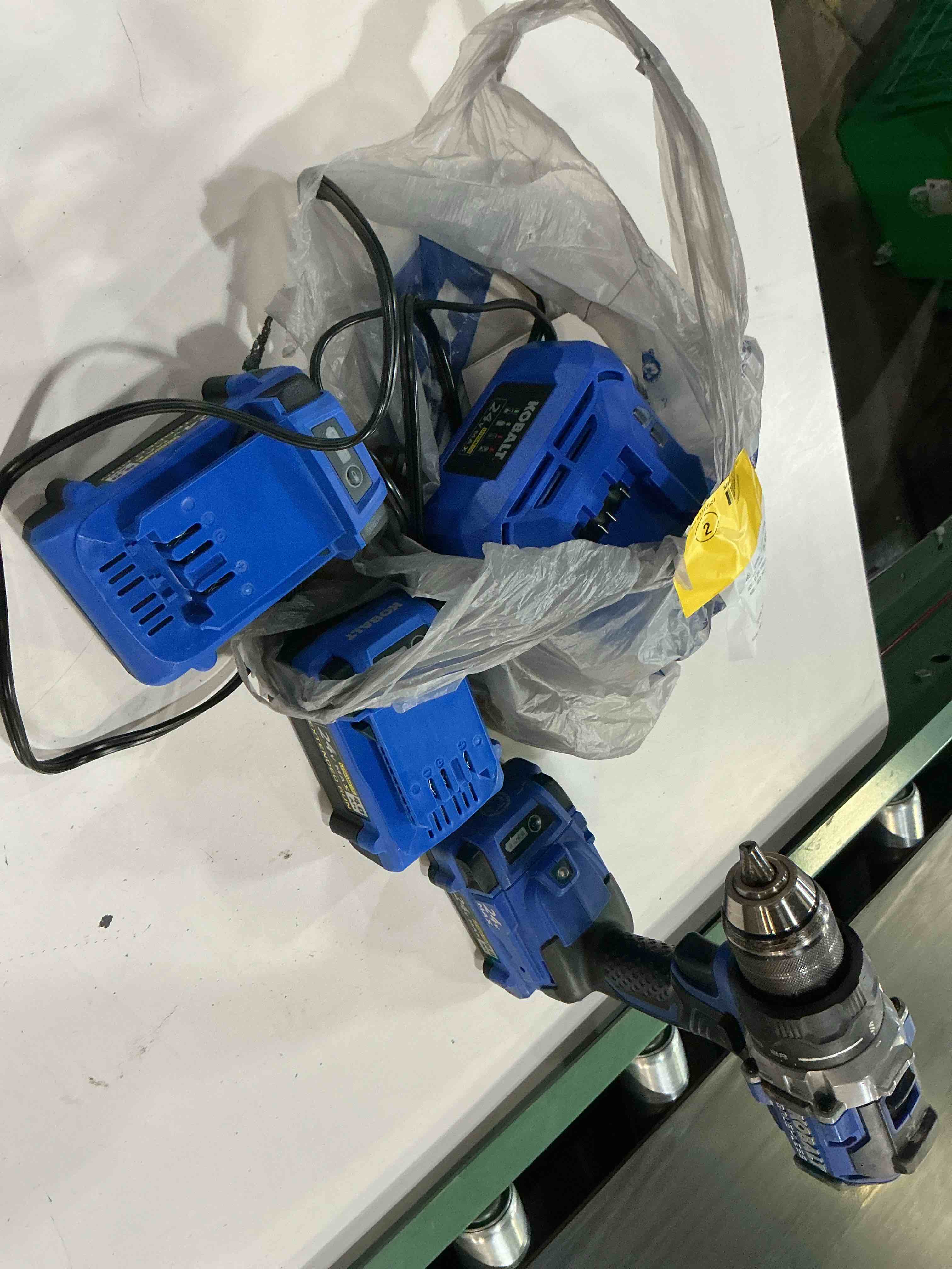 Condition photo showing As Is for  kobalt 24-volt 1/2-in keyless brushless cordless drill ( 1 -batteries included, and 2  charger included )