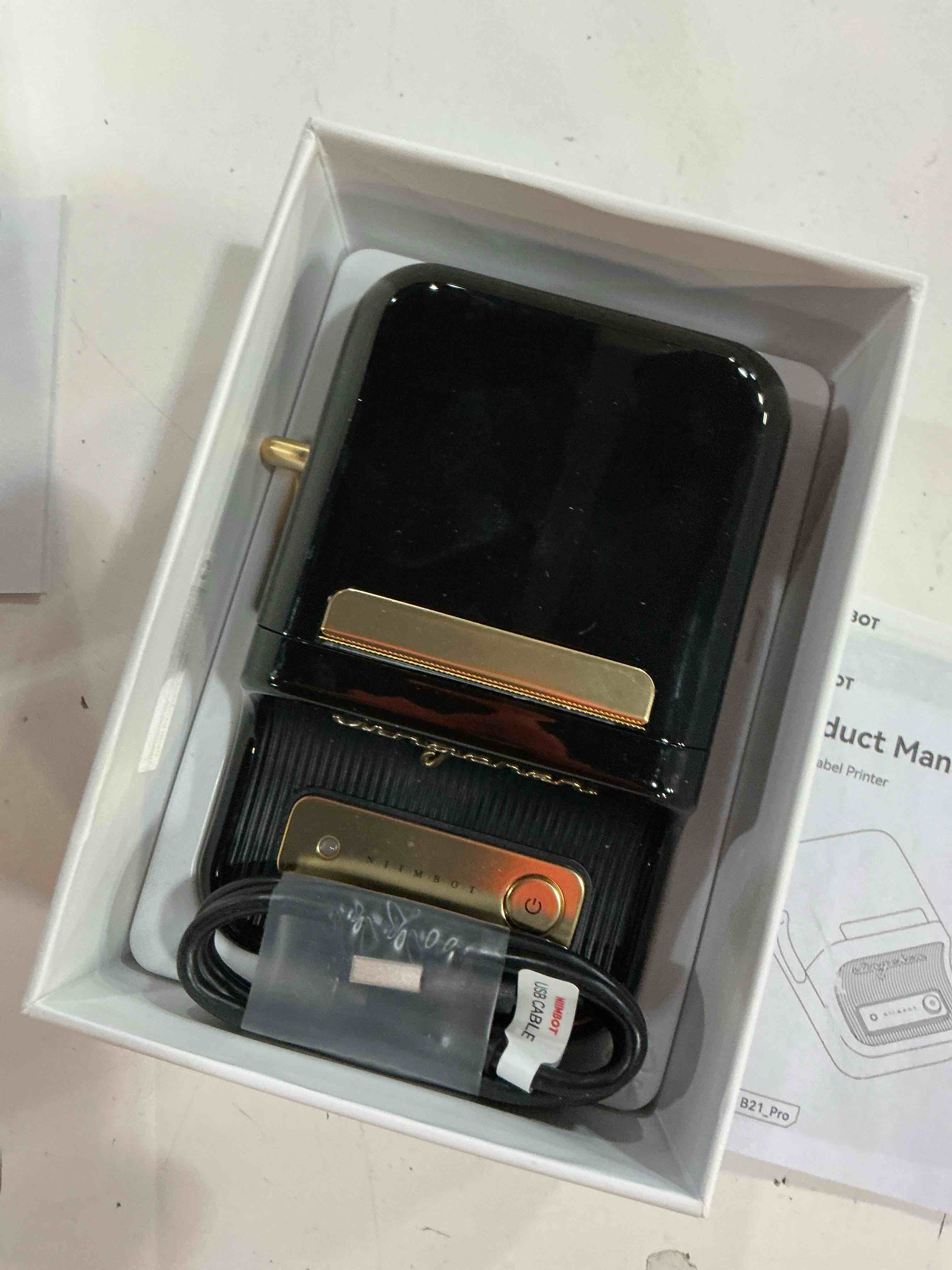 Condition photo showing Good Condition for niimbot b21 label maker machine with tape, 2 inch portable sticker printer thermal labeler for gift jar candle address labels for home office business organization, supports mobile & pc, black