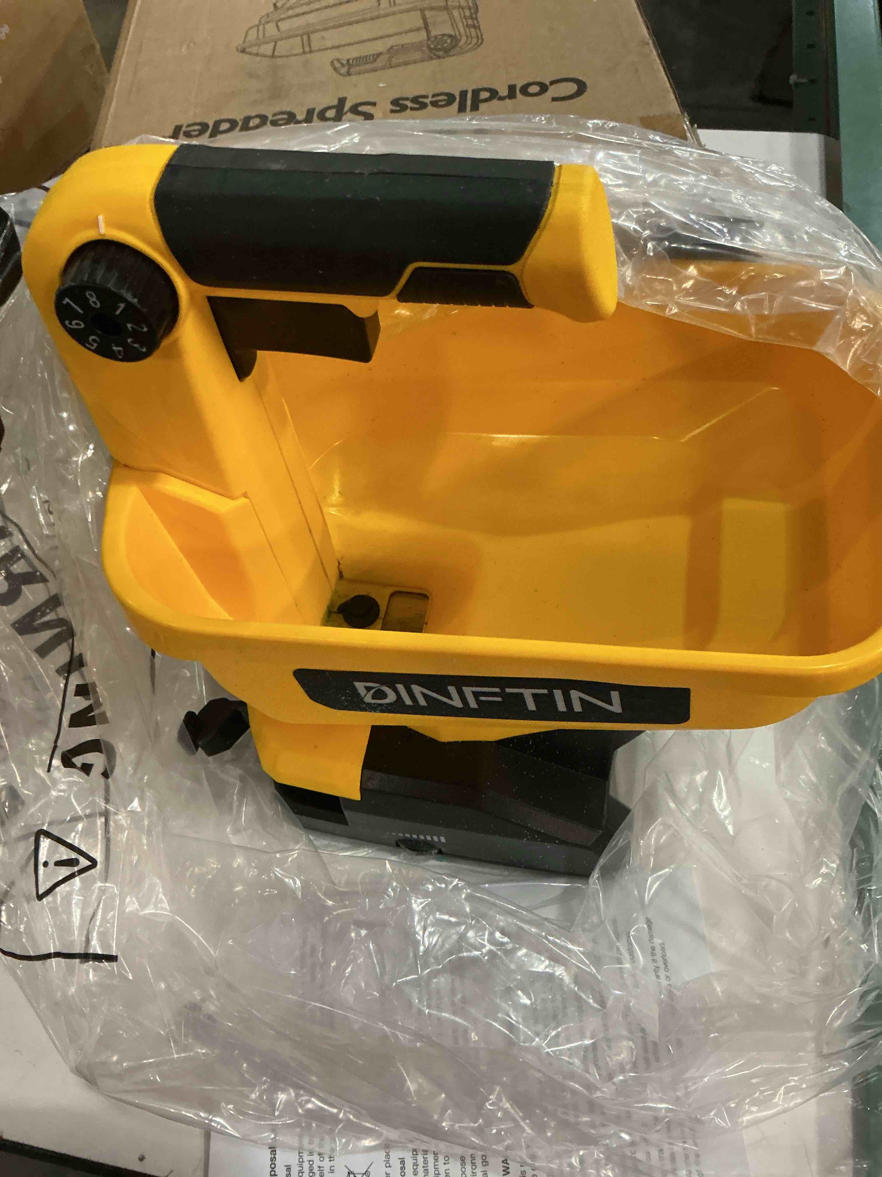Condition photo showing As Is for rozlchar power spreader compatible for dewalt 20v/60v battery, seed spreader for year-round, covers up to 5,000 sq. ft.(tool only, no battery) yellow
