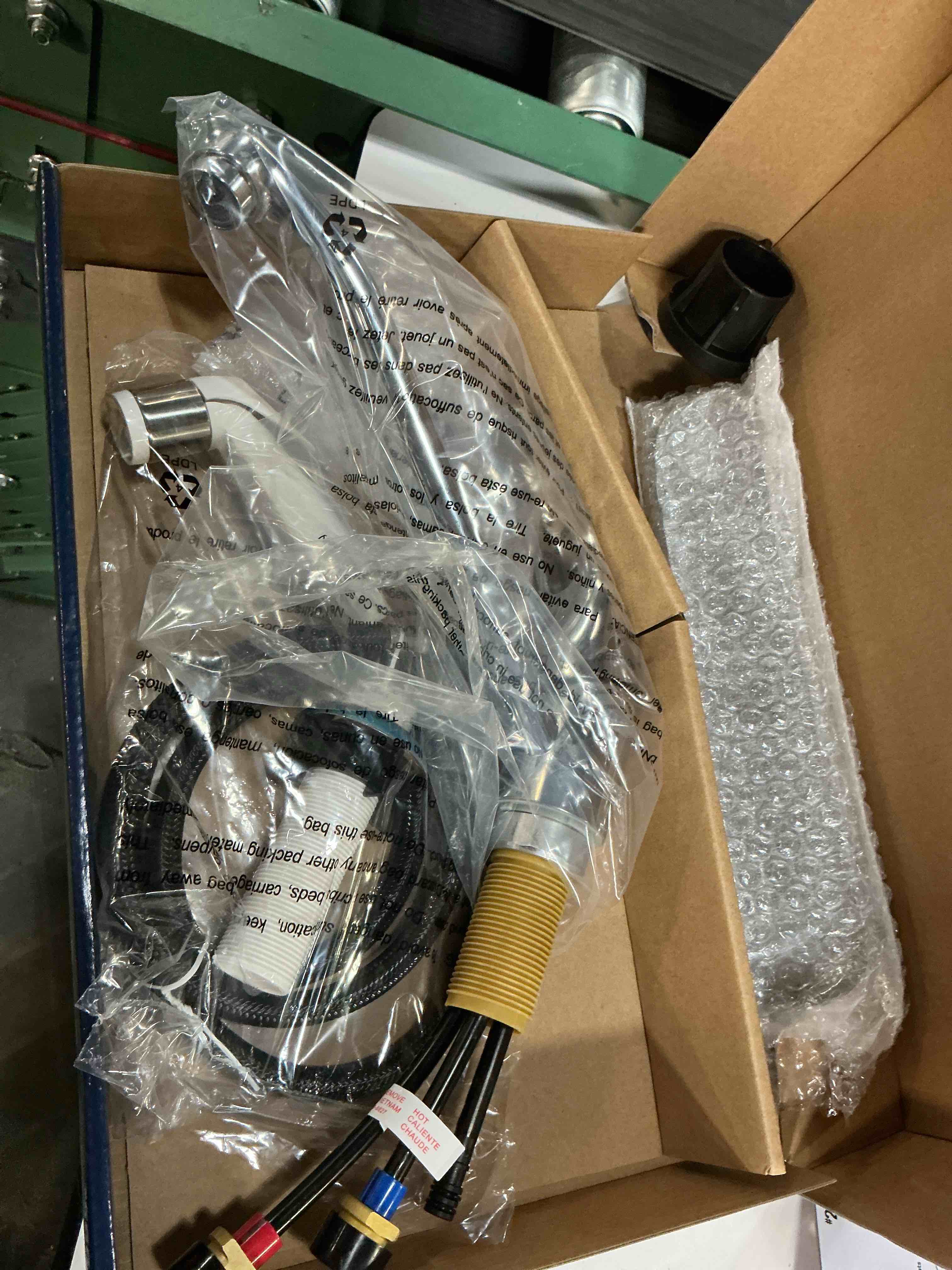 Condition photo showing As Is for project source wakebridge polished chrome single handle deck-mount kitchen faucet (includes deck plate) (includes side sprayer)