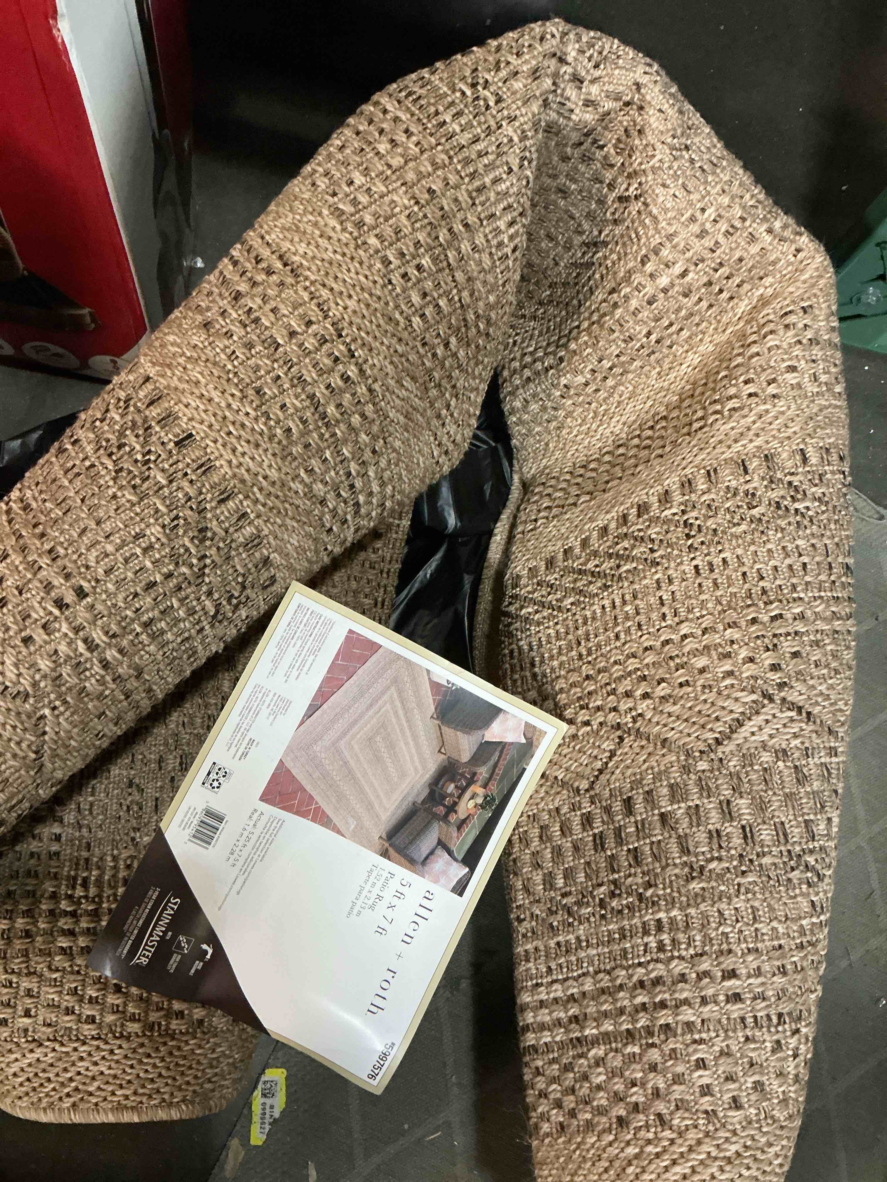 Condition photo showing As Is for allen + roth with stainmaster jute-style woven 5 x 7 (ft) loomed polypropylene tan rectangular