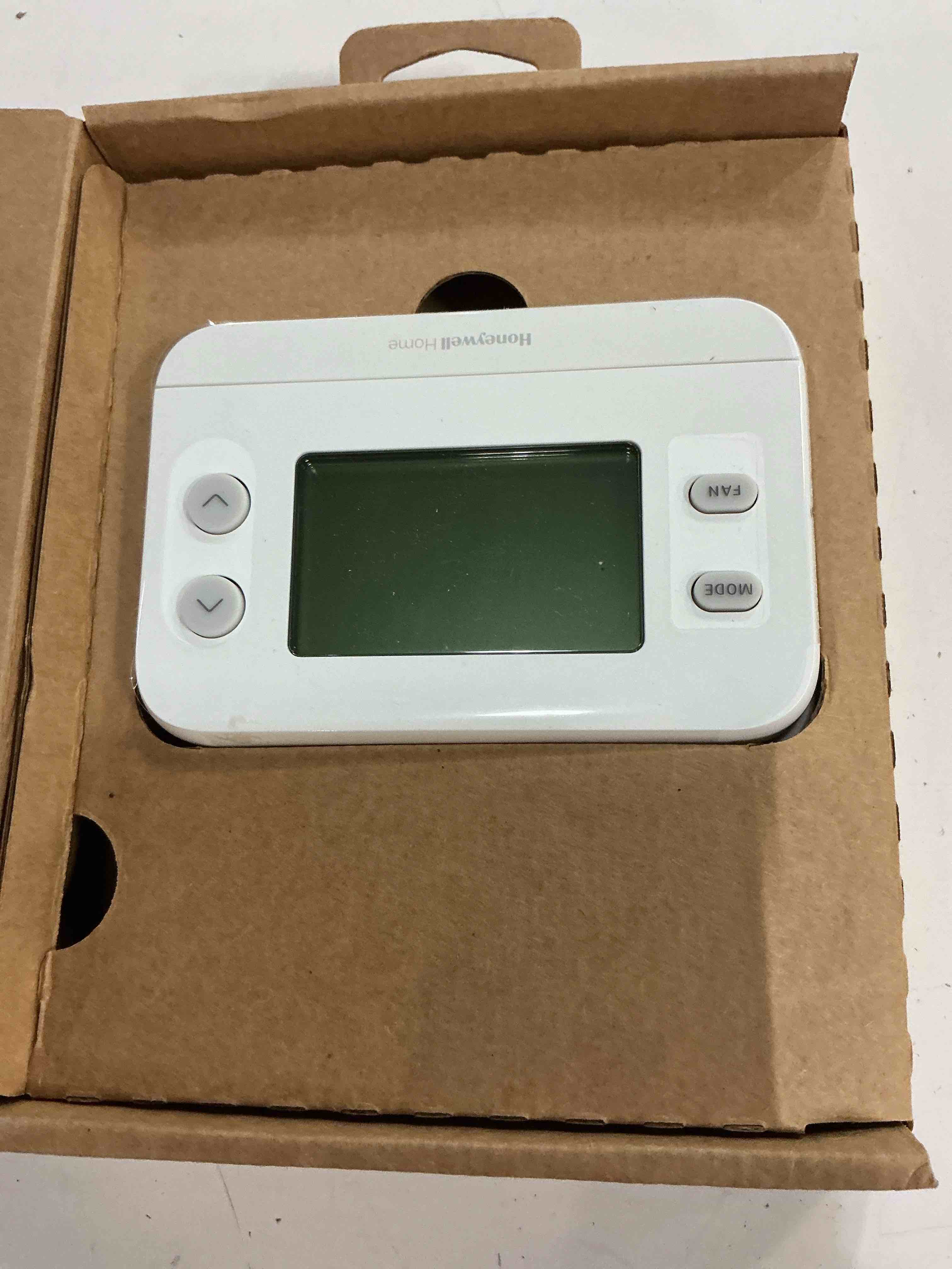 Condition photo showing Good Condition for new! honeywell home non-programmable thermostat, single-stage, 1 heat/1 cool compatibility, x1n, white