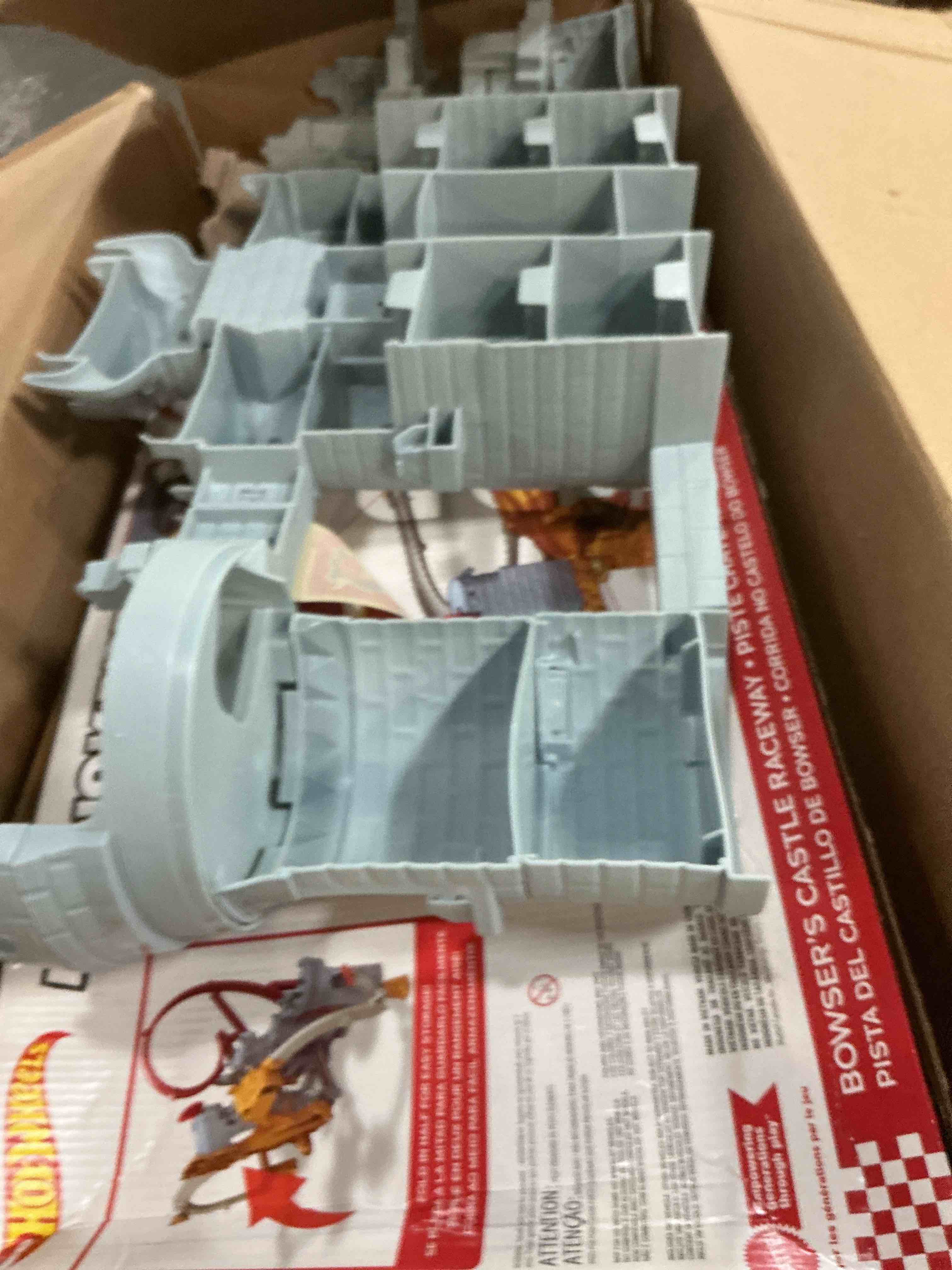 Condition photo showing As Is for hot wheels toy car track set, mario kart bowser’s castle playset & 1:64 scale die-cast kamek, interactive play, with storage for 30+ vehicles bowser track set