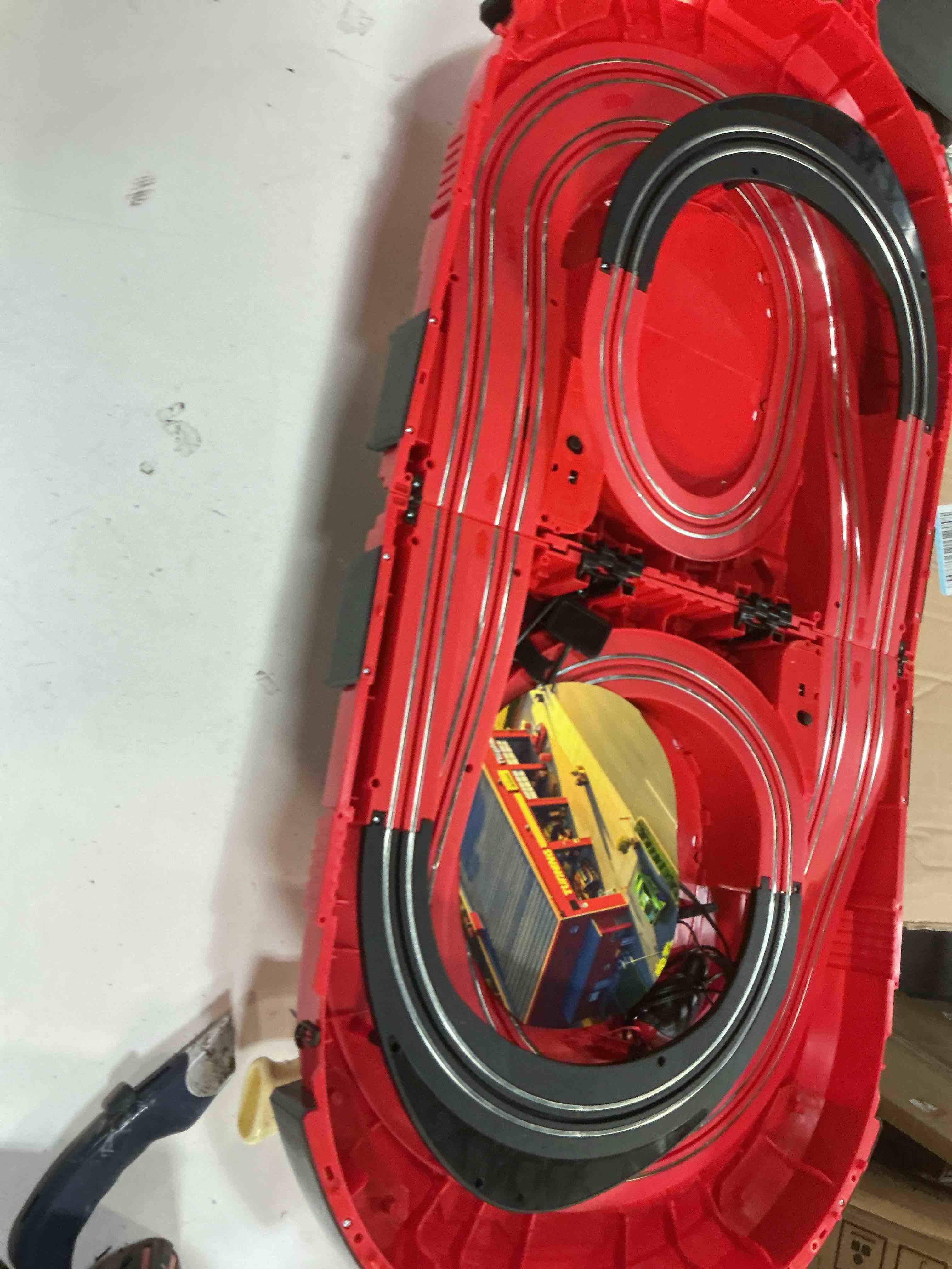 Condition photo showing As Is for carrera speed arena police chase - portable slot car race track includes 2 cars - battery-powered beginner toy racing set for kids ages 3 years and up