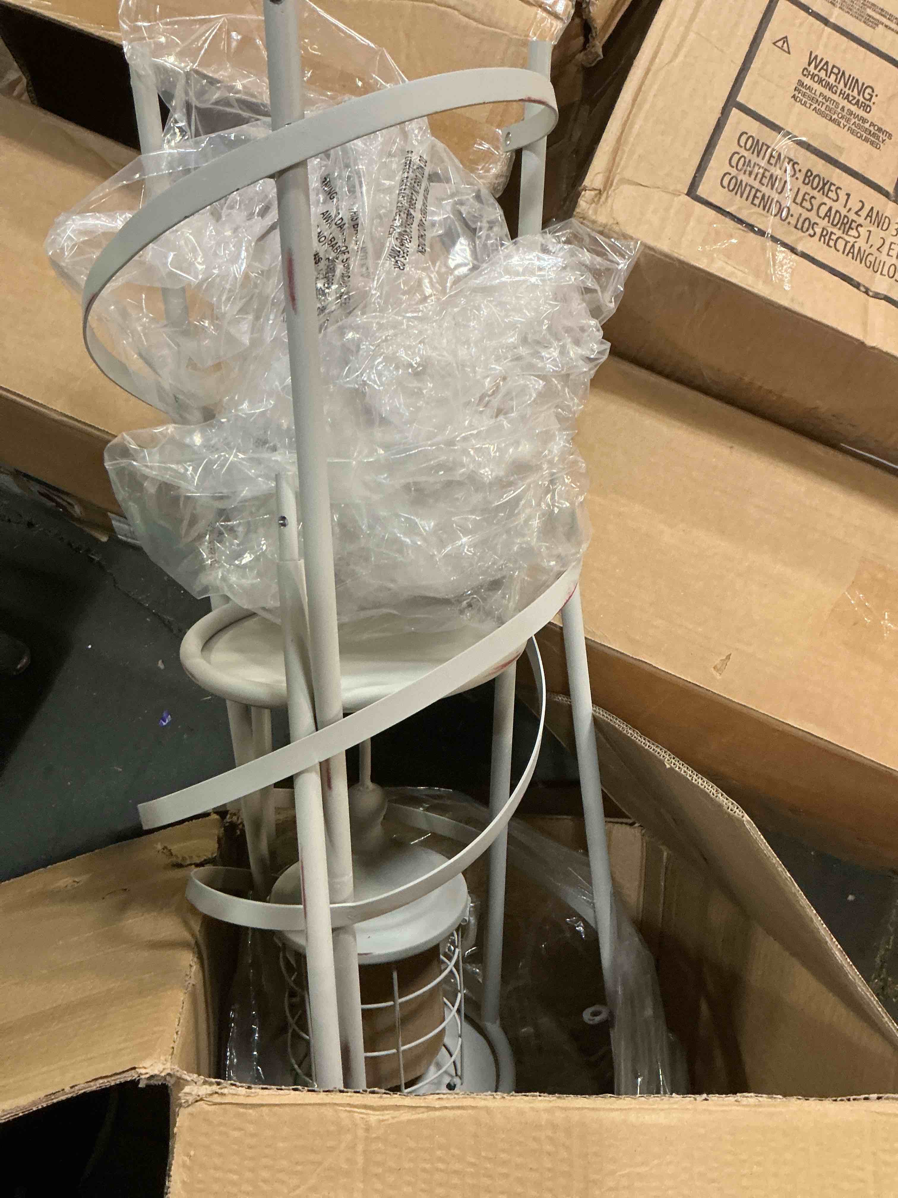 Condition photo showing As Is for cape craftsmen 5 tier metal white distressed lighthouse metal display unit with glass cylinder for candle