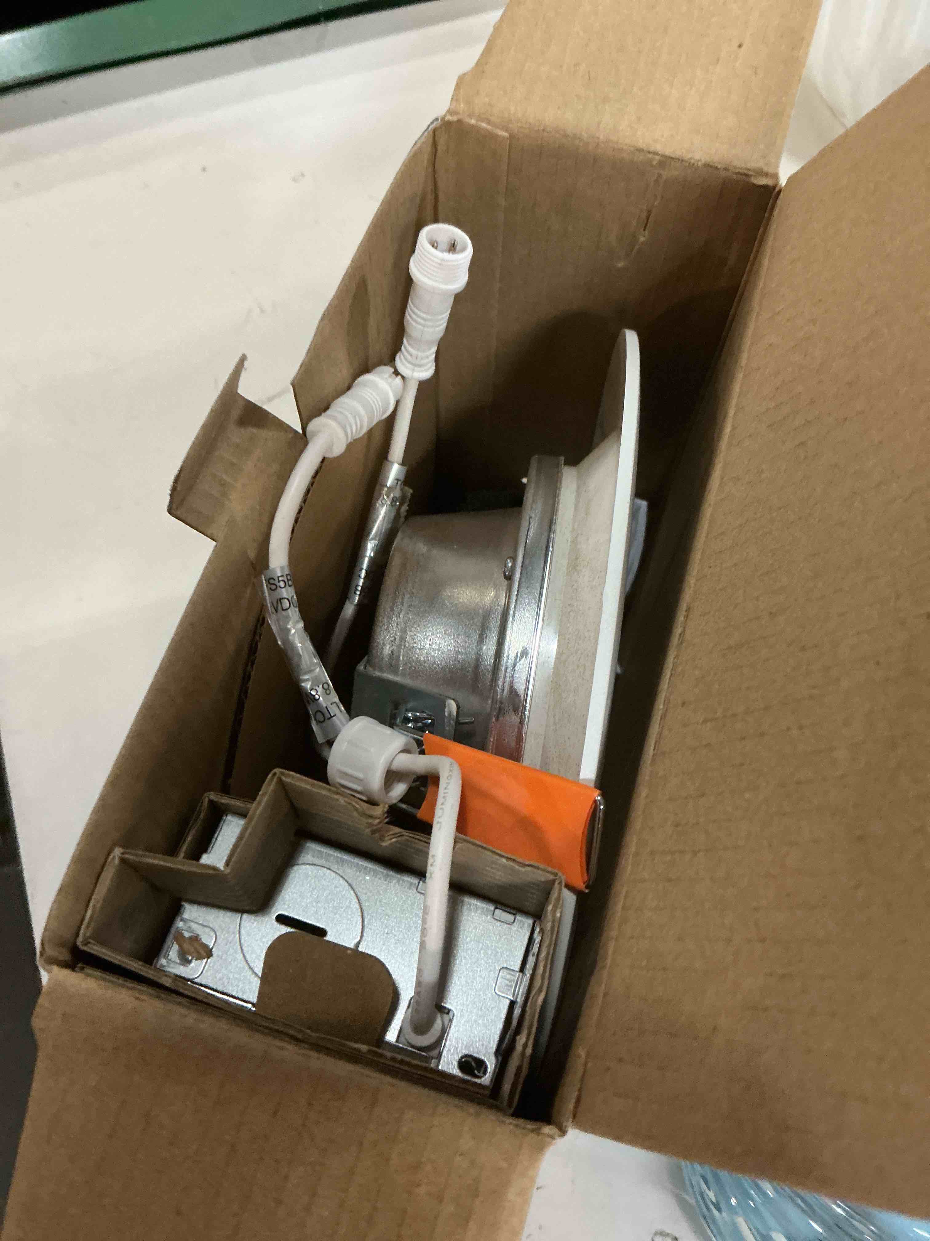Condition photo showing As Is for halo white 6-in 750-lumen switchable white round dimmable led canless wet rated recessed downlight 1243311