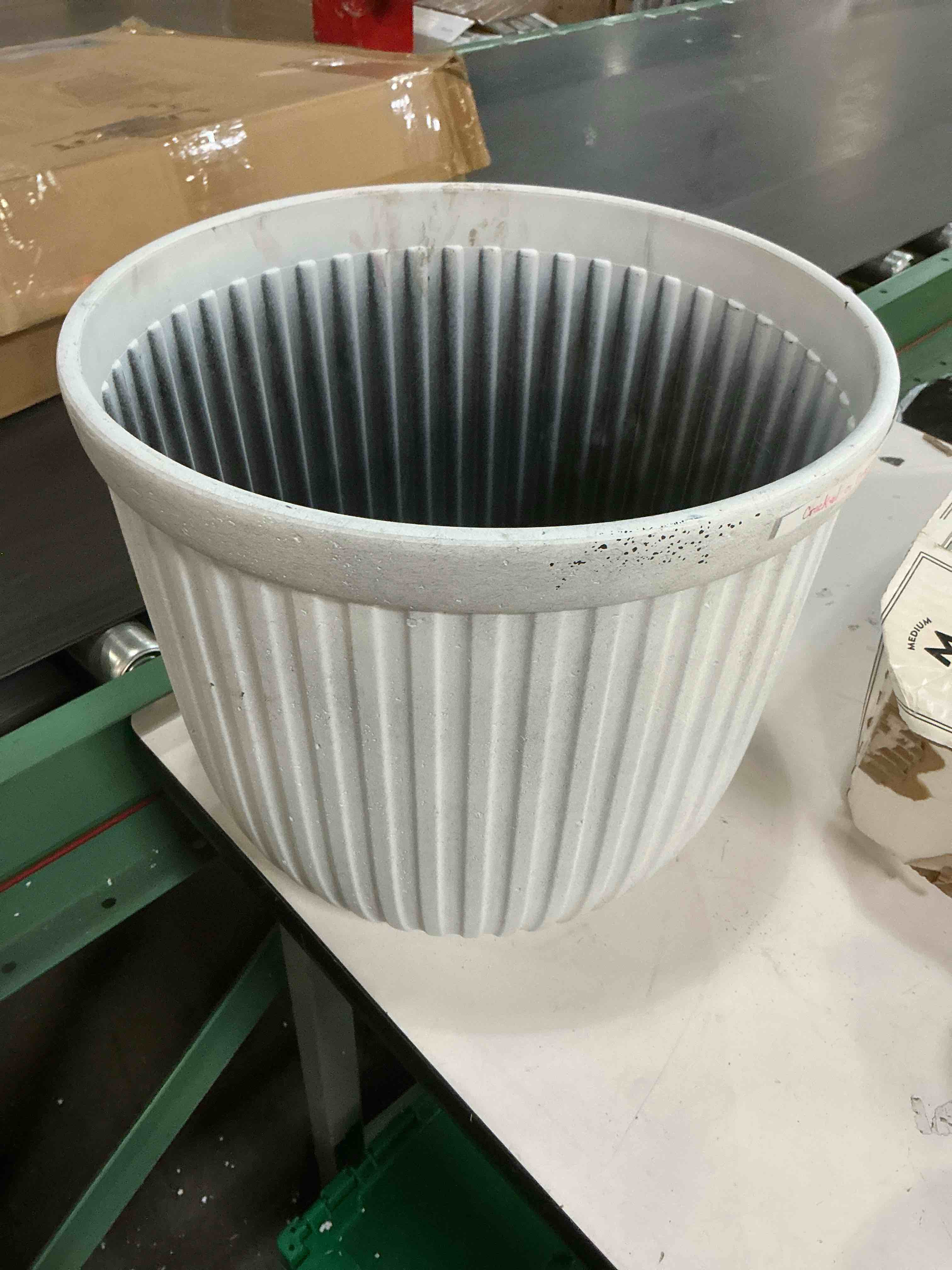 Condition photo showing As Is for origin 21 round 13.03-in w x 13.03-in l x 11.97-in h white recycled plastic indoor/outdoor planter 5990111