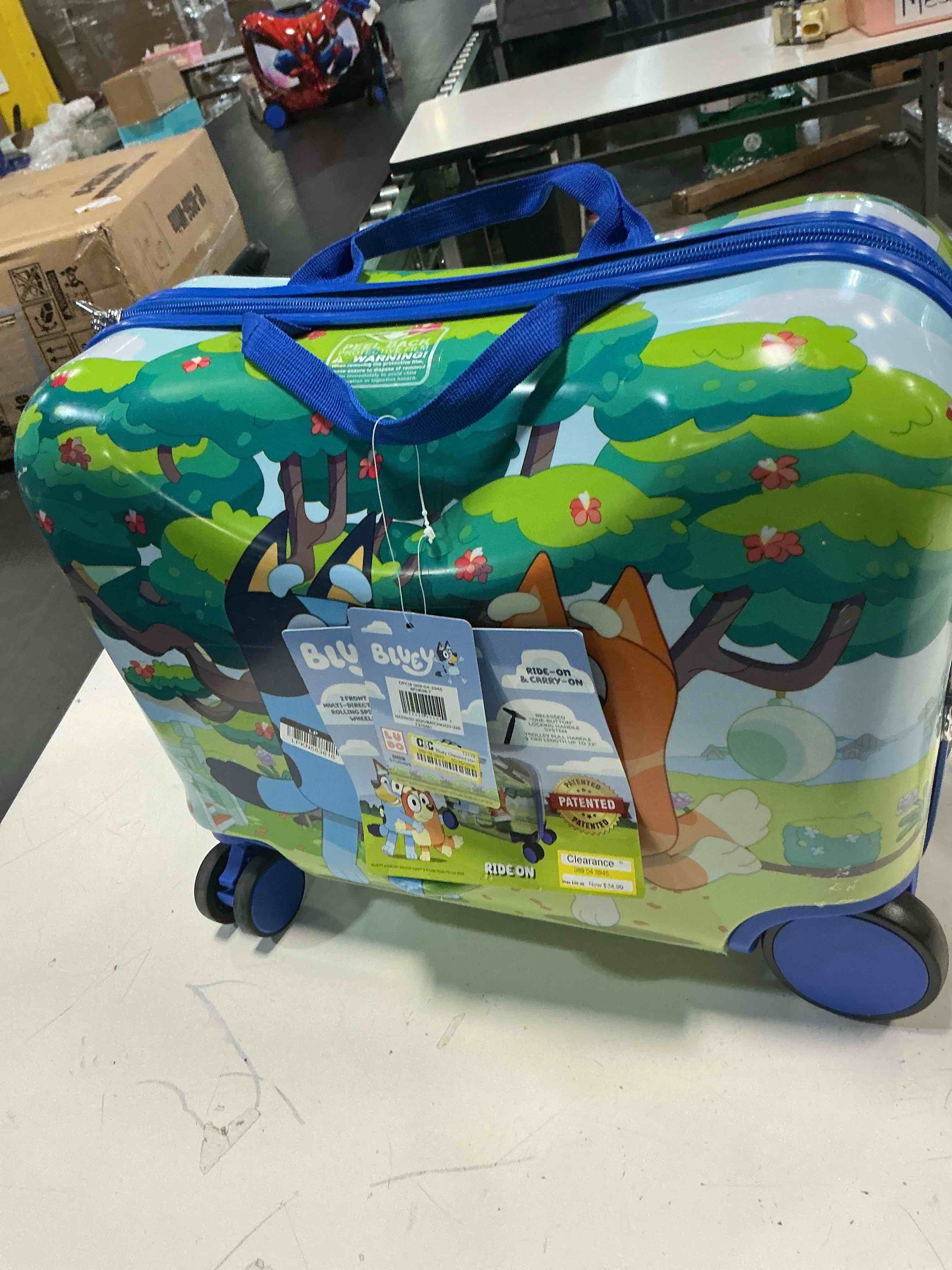 Condition photo showing Good Condition for bluey checked hardside ride on luggage - bluey