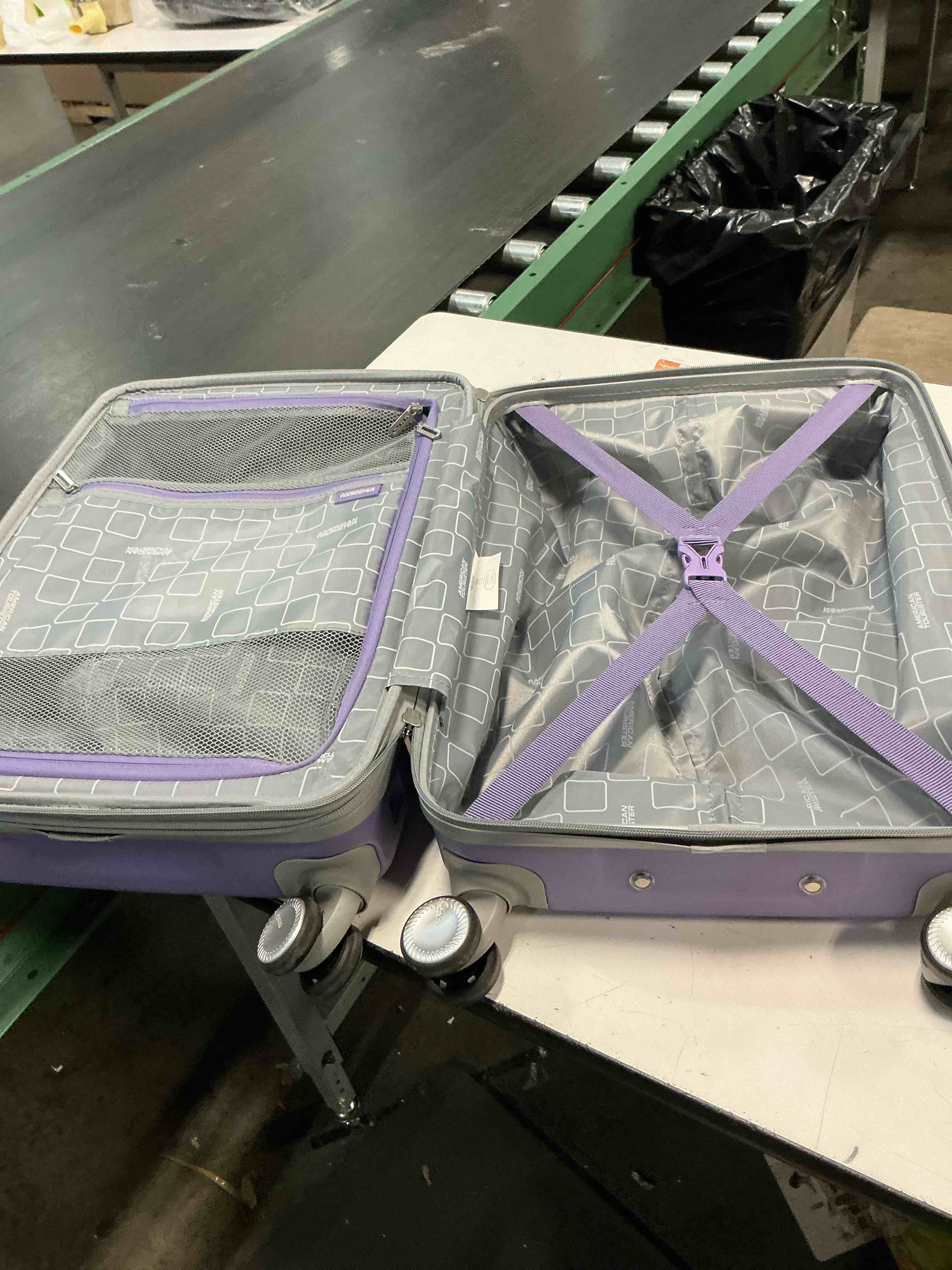 Condition photo showing As Is for american tourister checkered 2.0 hardside carry on spinner suitcase – purple haze small 