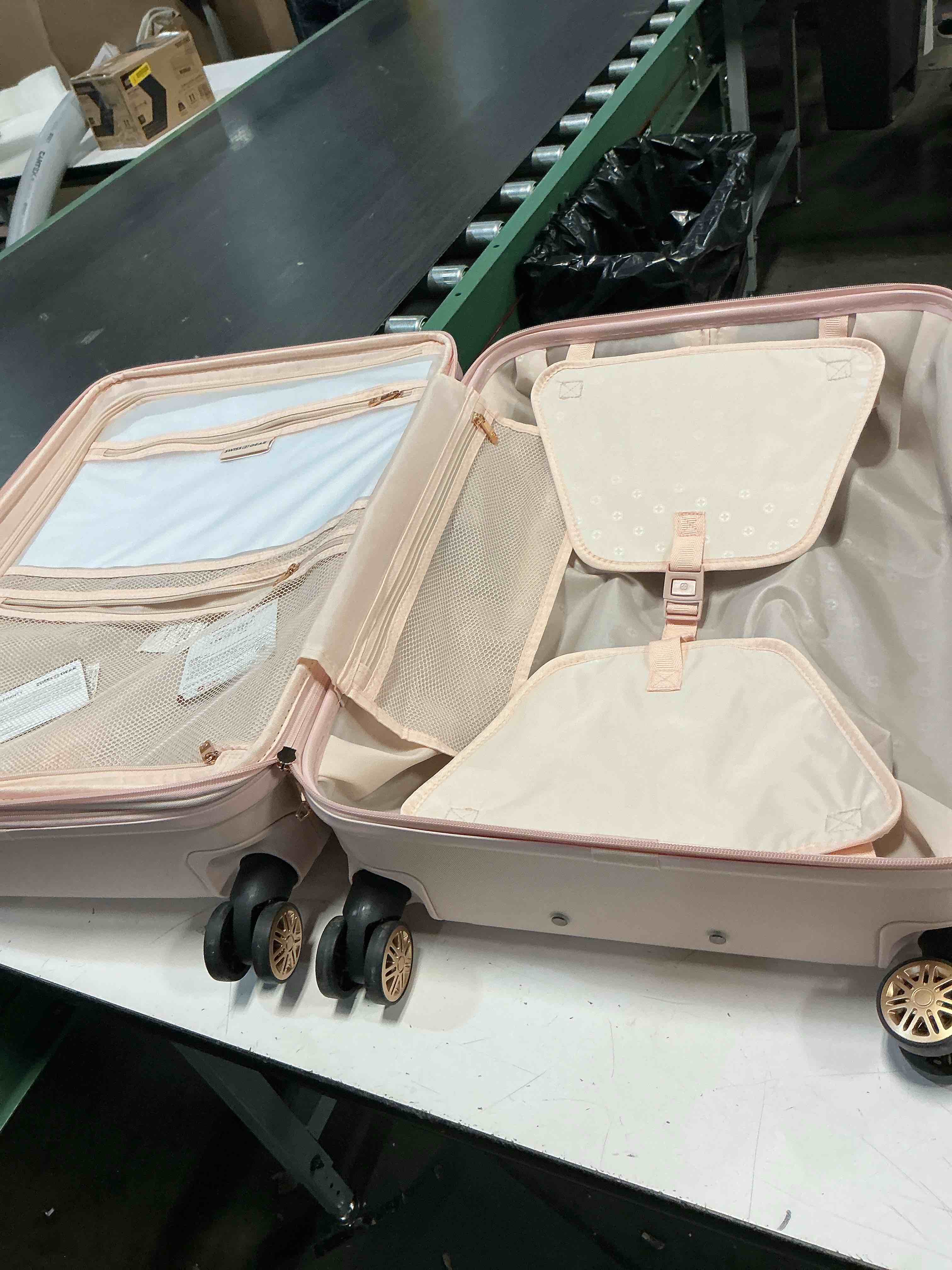 Condition photo showing As Is for swissgear cascade ii hardside medium checked spinner suitcase 8 wheel 33 lb capacity - rose