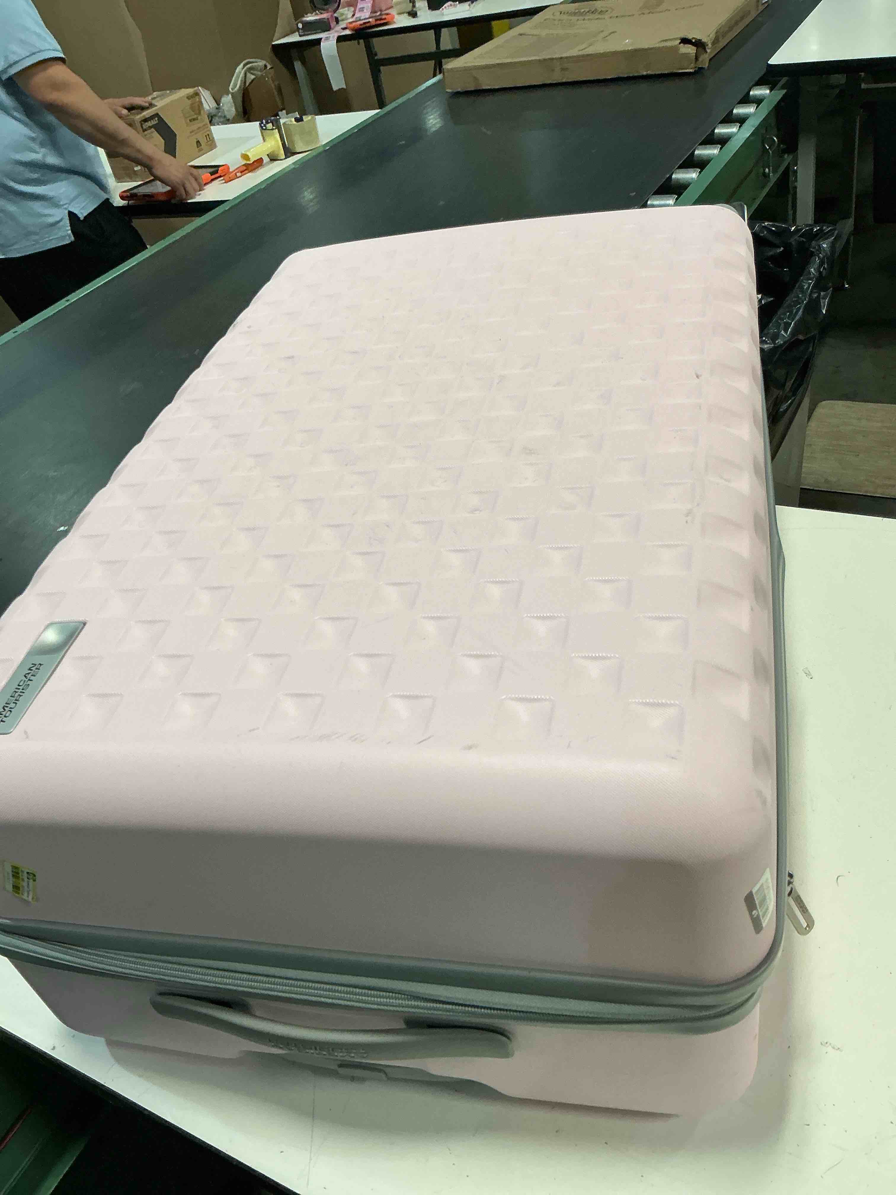 Condition photo showing As Is for american tourister checkered 2.0 hardside large spinner suitcase - light pink