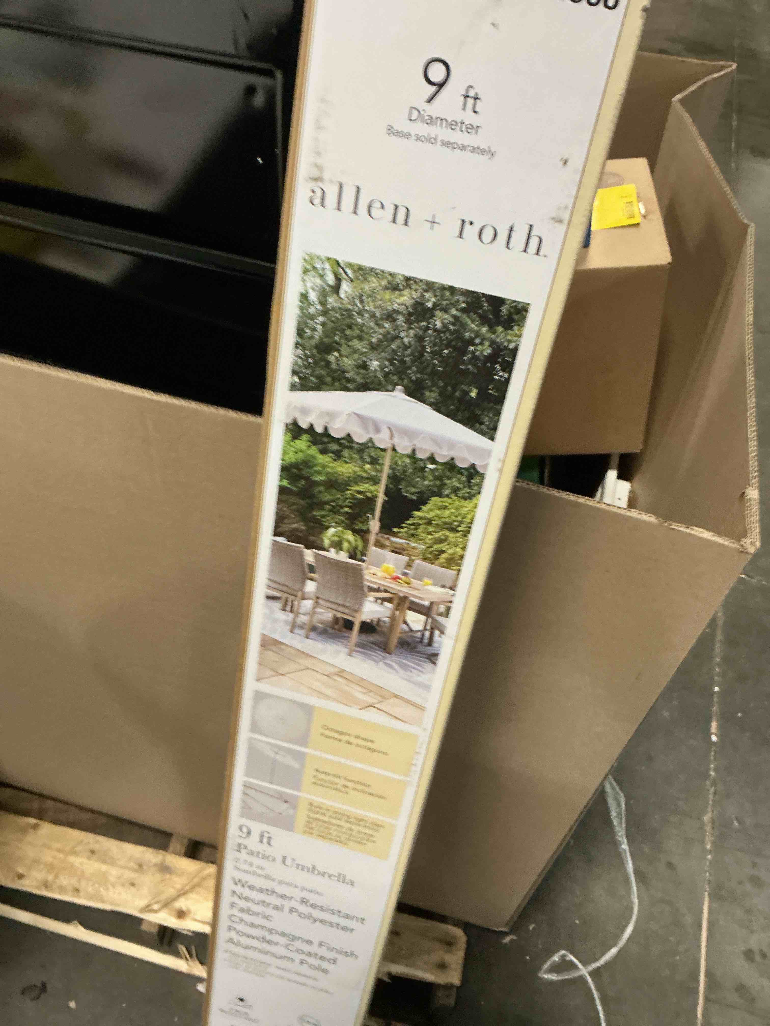 Condition photo showing As Is for allen + roth 9-ft aluminum beige auto-tilt market patio umbrella
