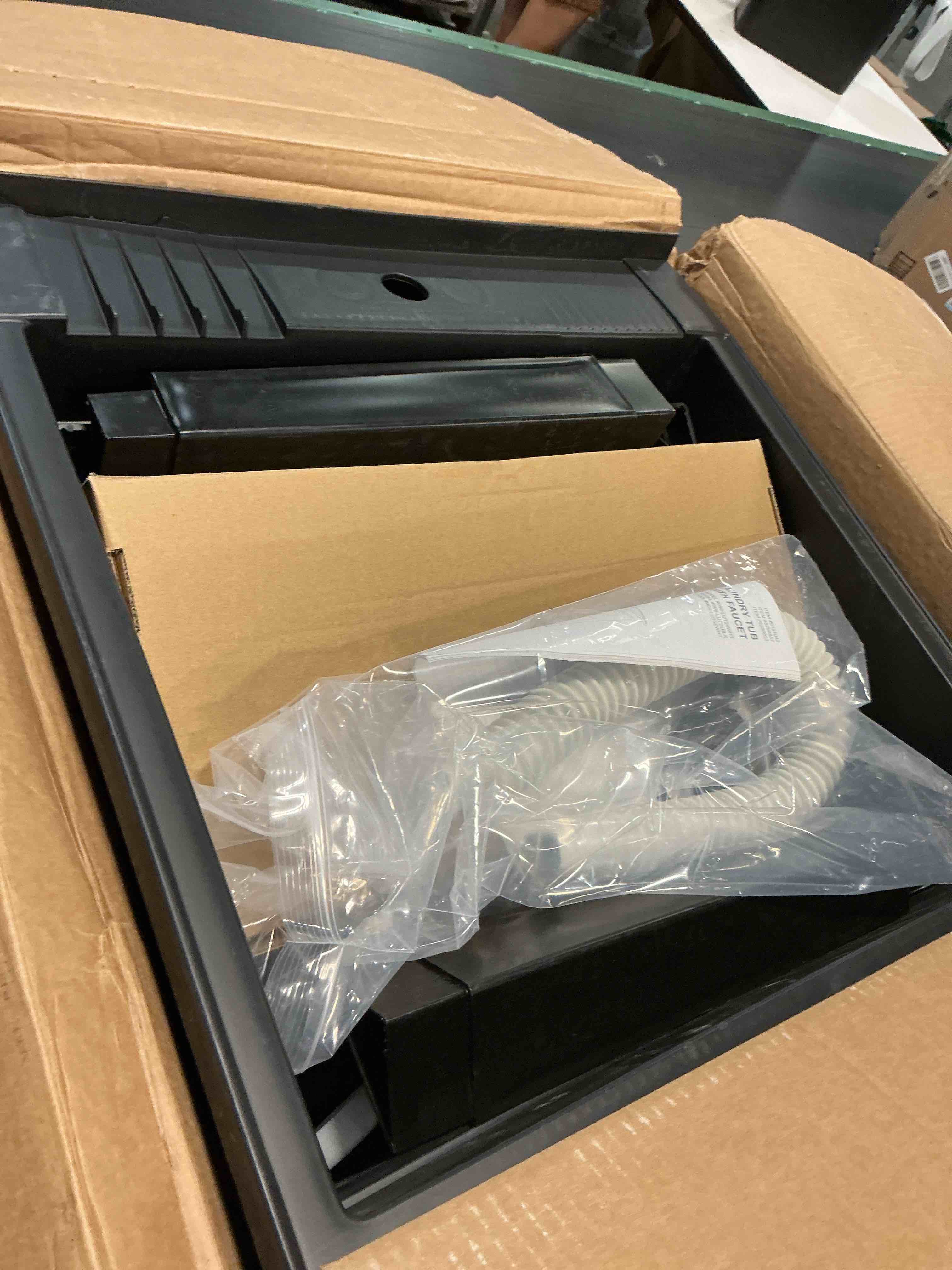 Condition photo showing As Is for project source 24-in x 24-in 1 -basin black freestanding utility tub with drain with faucet