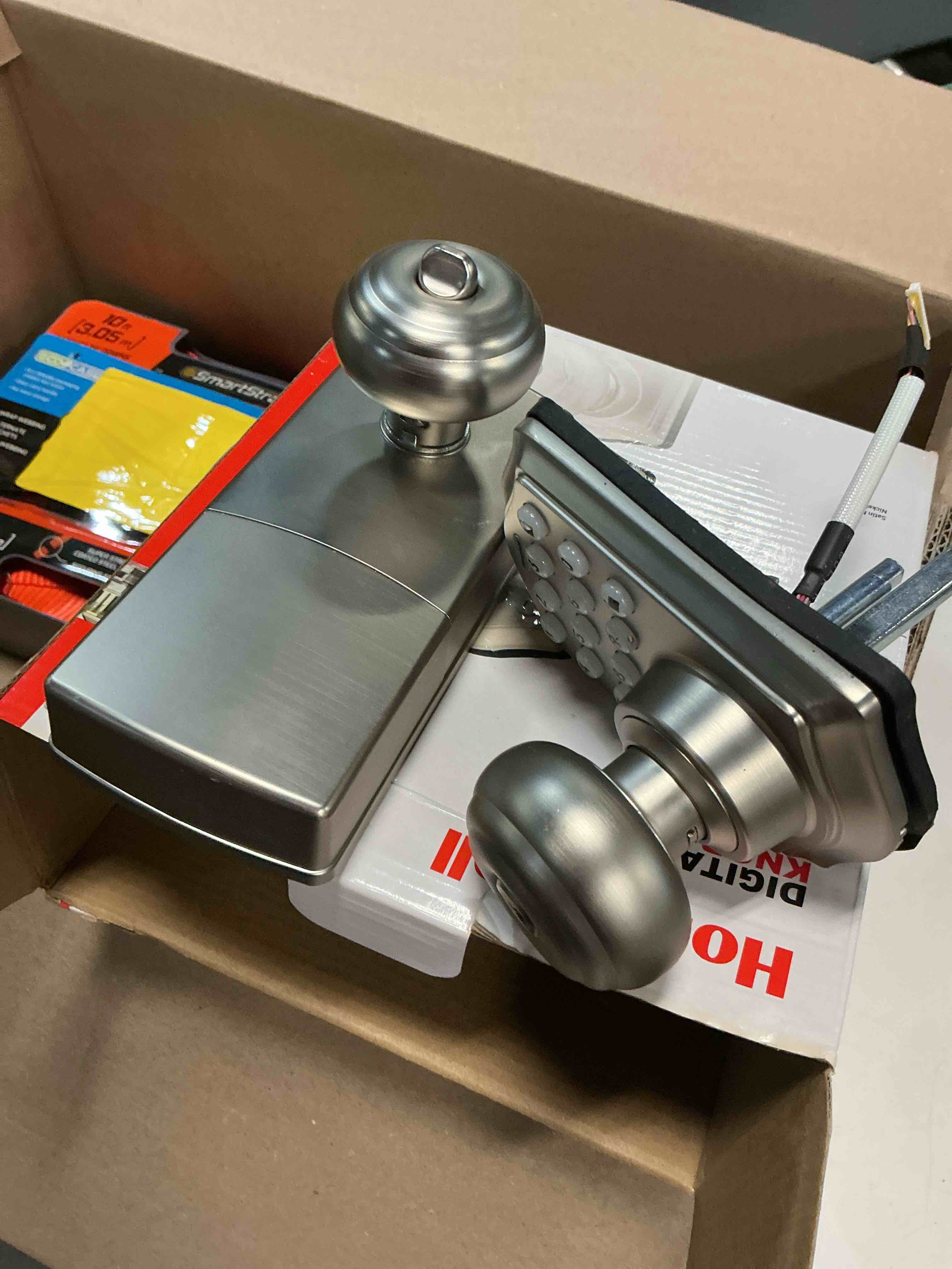 Condition photo showing As Is for honeywell satin nickel digital knob electronic keypad entry door lock