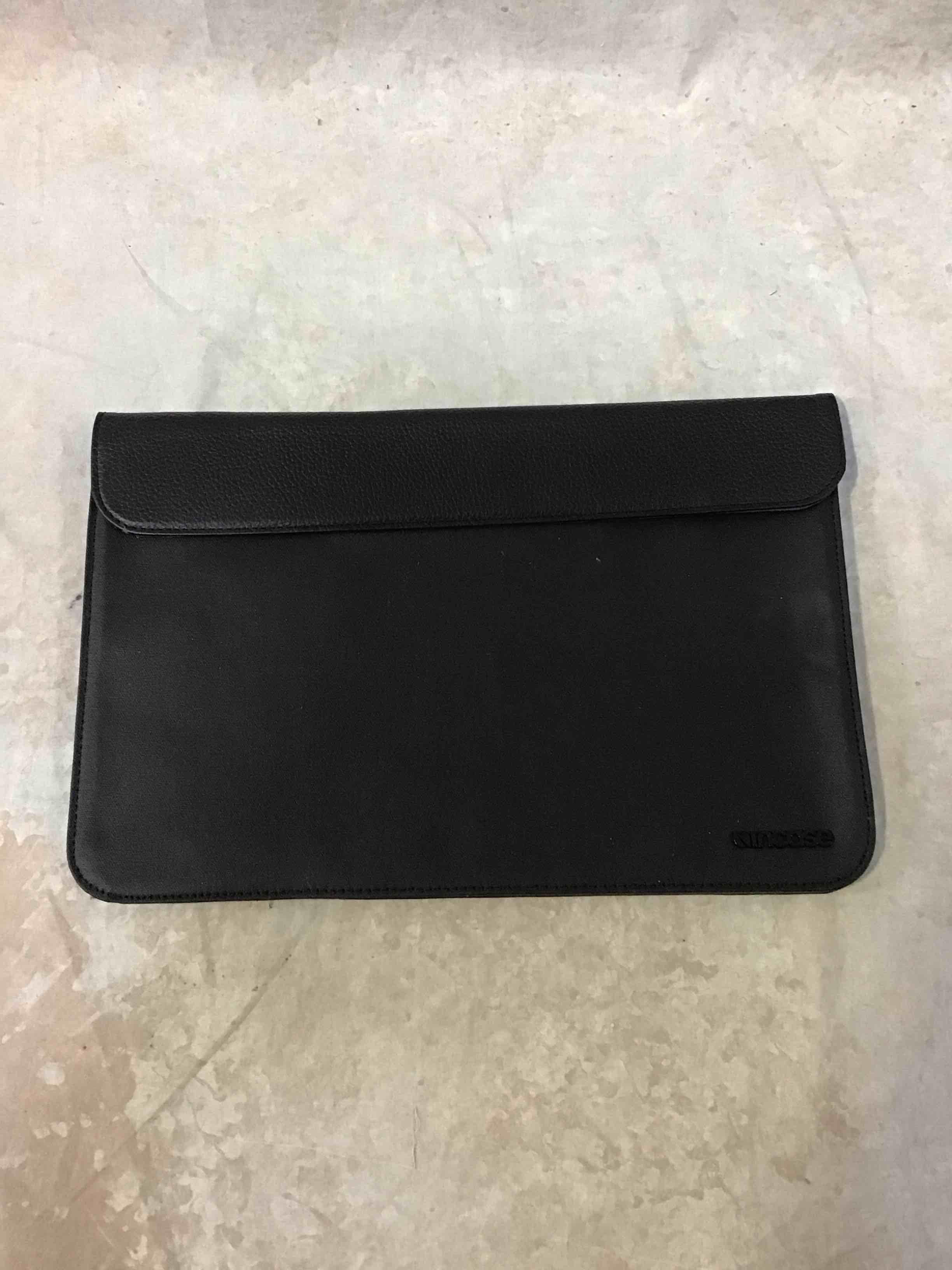 Condition photo showing Good Condition for notebook/laptop sleeve 