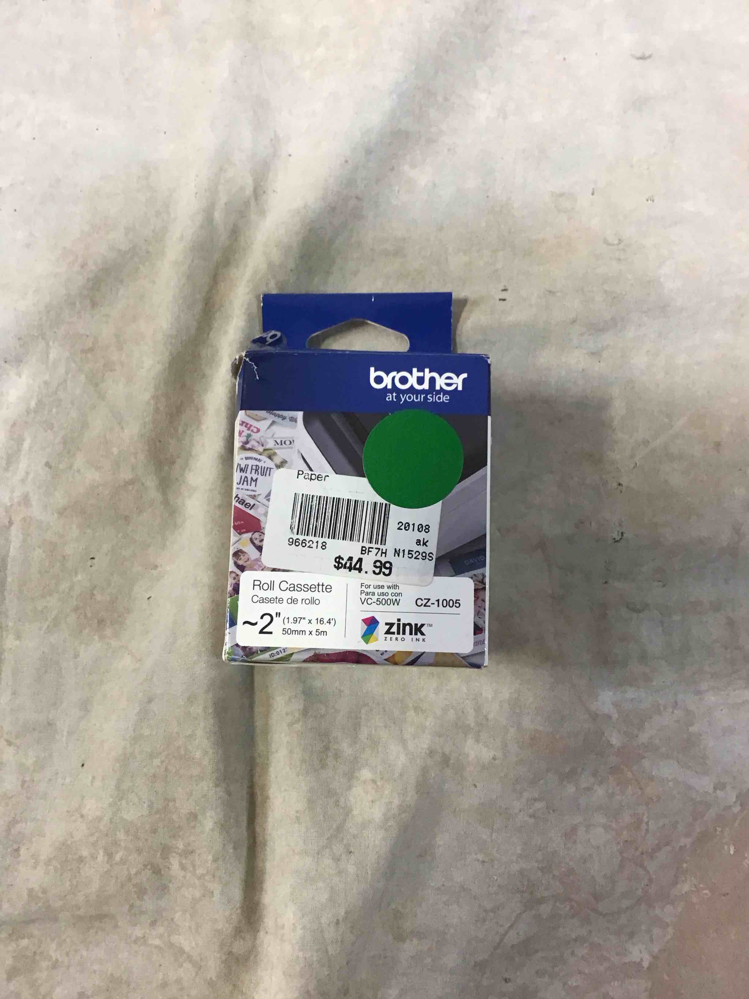 Condition photo showing New/Like New for brother genuine cz-1005 continuous length ~ 2 (1.97”) 50 mm wide x 16.4 ft. (5 m) long label roll featuring zink zero ink technology