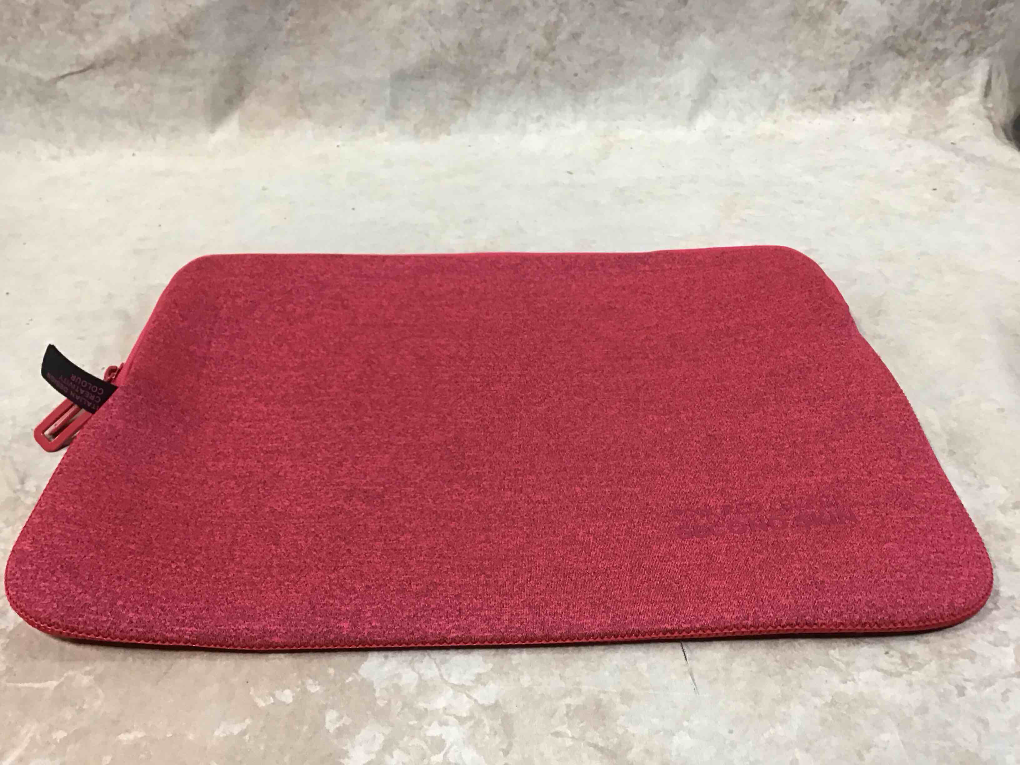 Condition photo showing New/Like New for tucano laptop sleeve