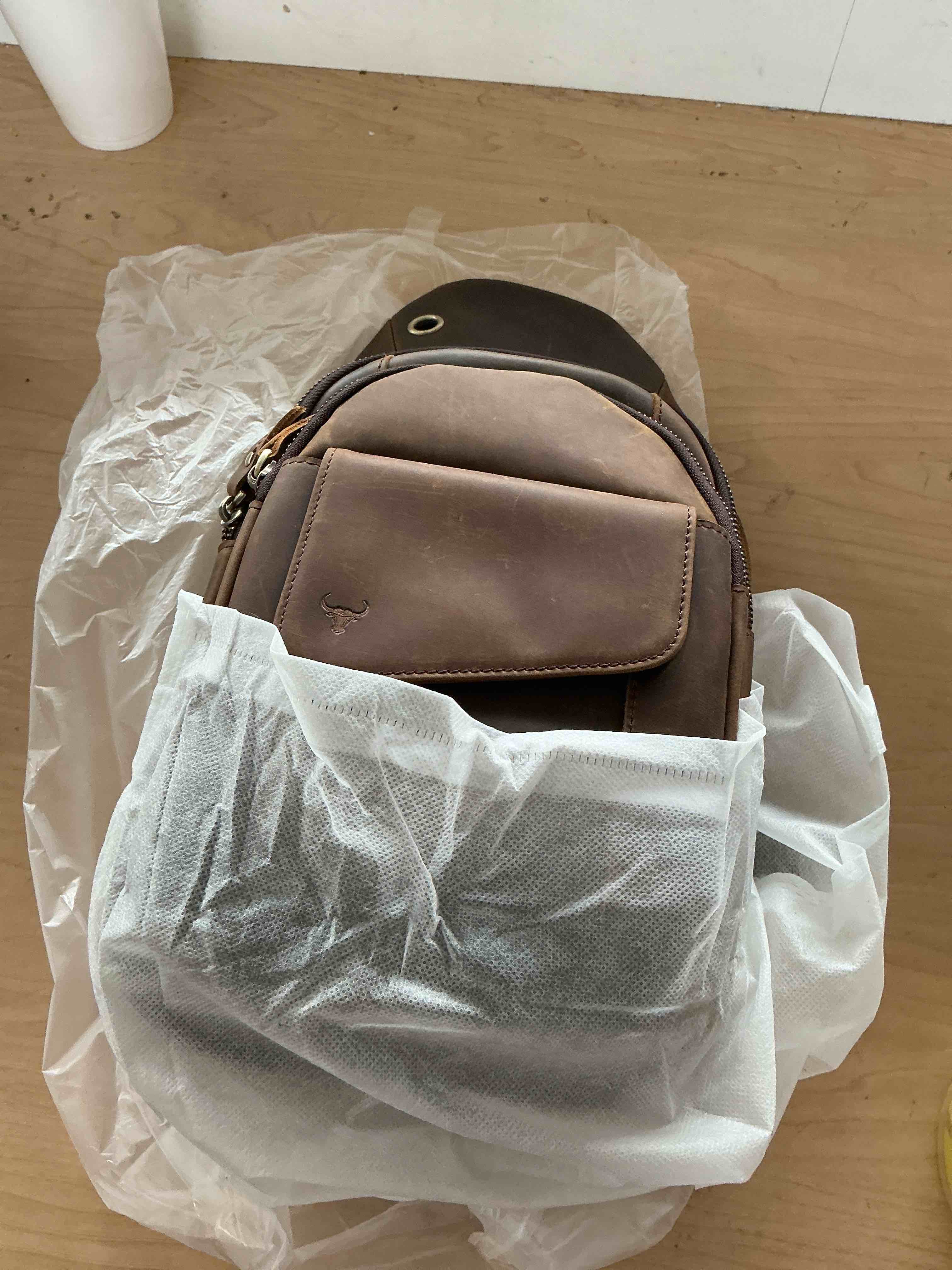 Condition photo showing New/Like New for le'aokuu men outdoor casual travel hiking tea crossbody chest sling bag rig one shoulder strap bag backpack men leather